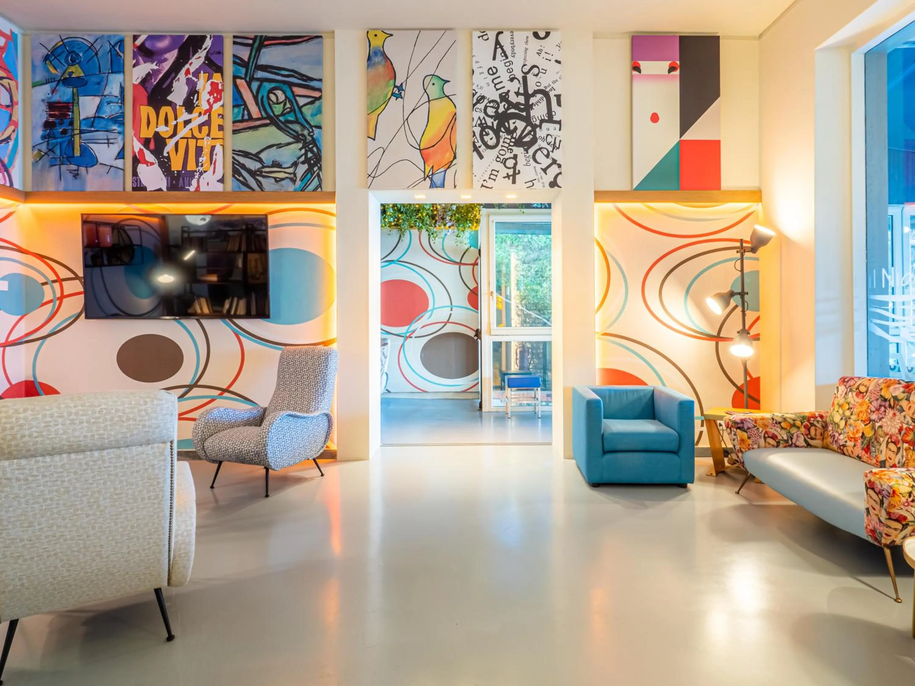 Communal lounge/ TV room in Hotel Il Nido