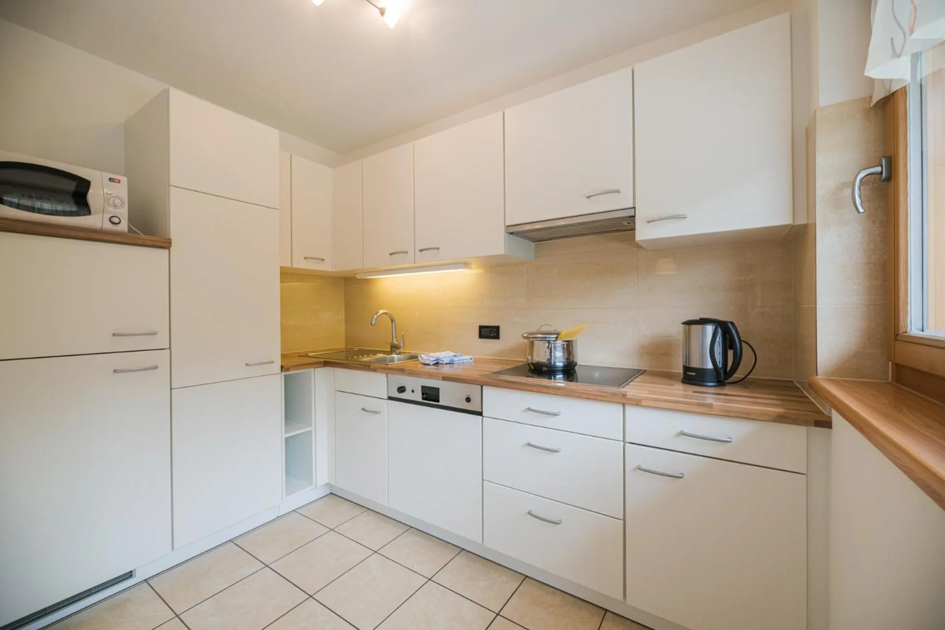 Kitchen or kitchenette in PLAN DE CORONES apartments