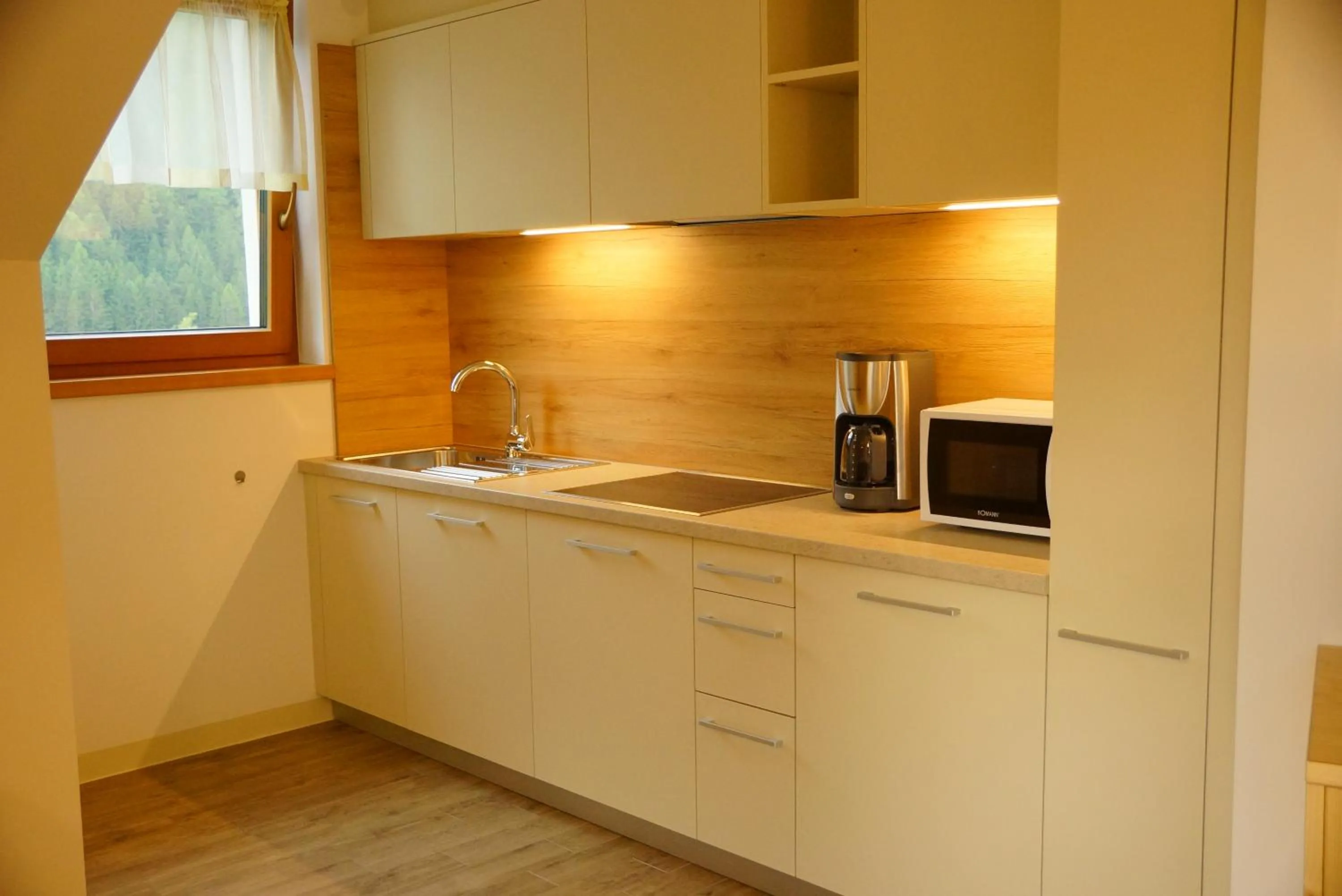 Kitchen or kitchenette in PLAN DE CORONES apartments