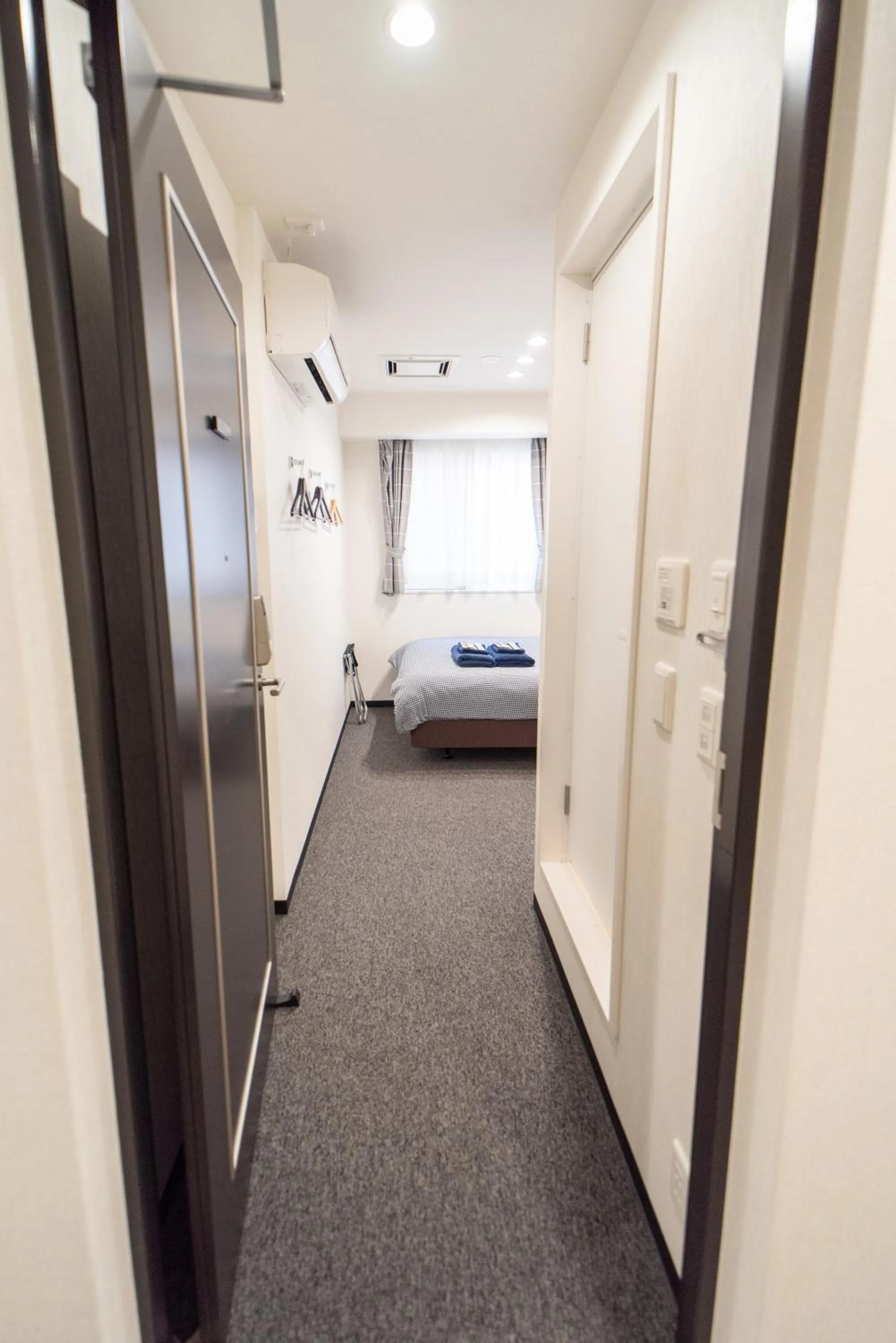 Photo of the whole room, Bed in Port House Shibuya