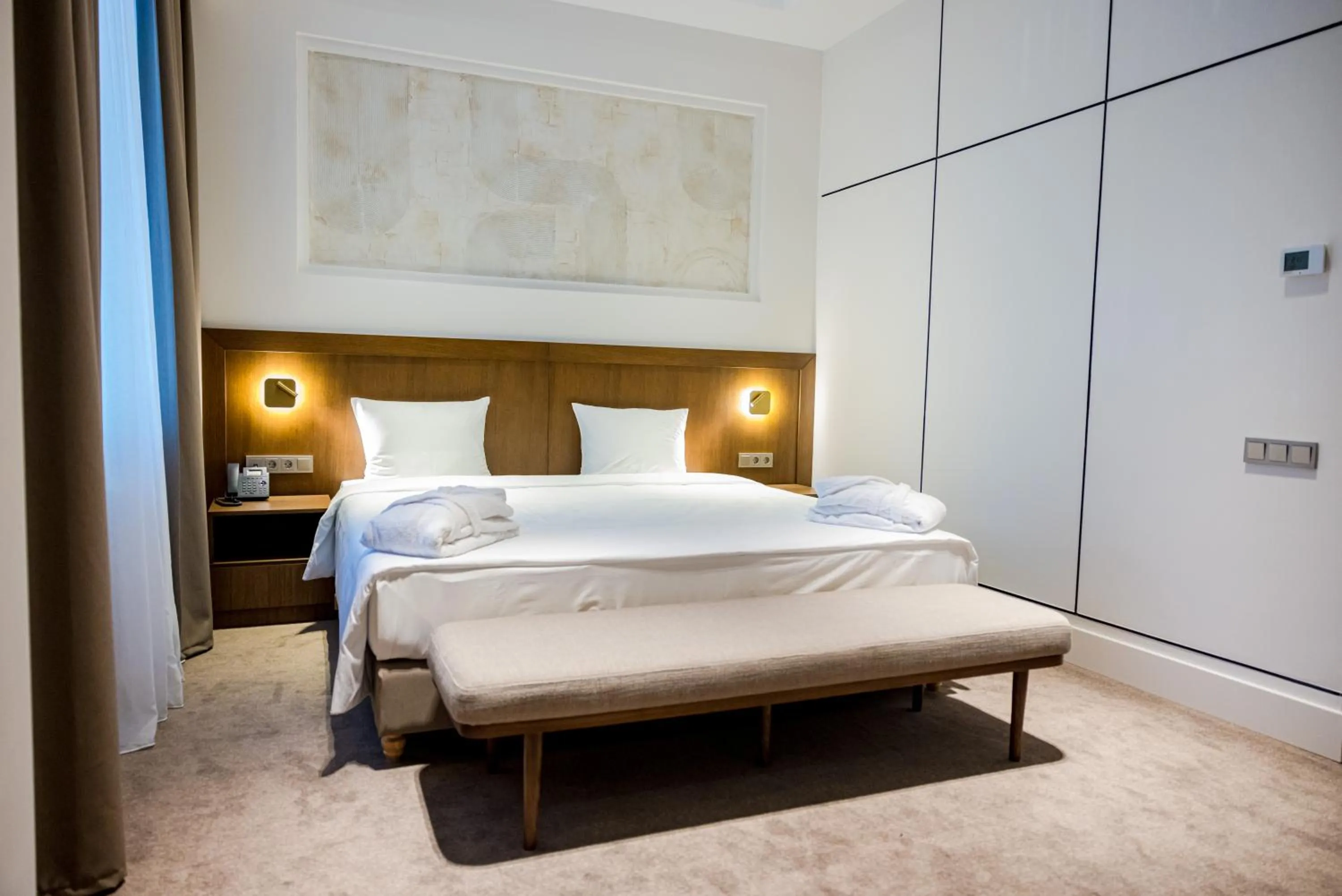 Bed in Grand Tien Shan Hotel