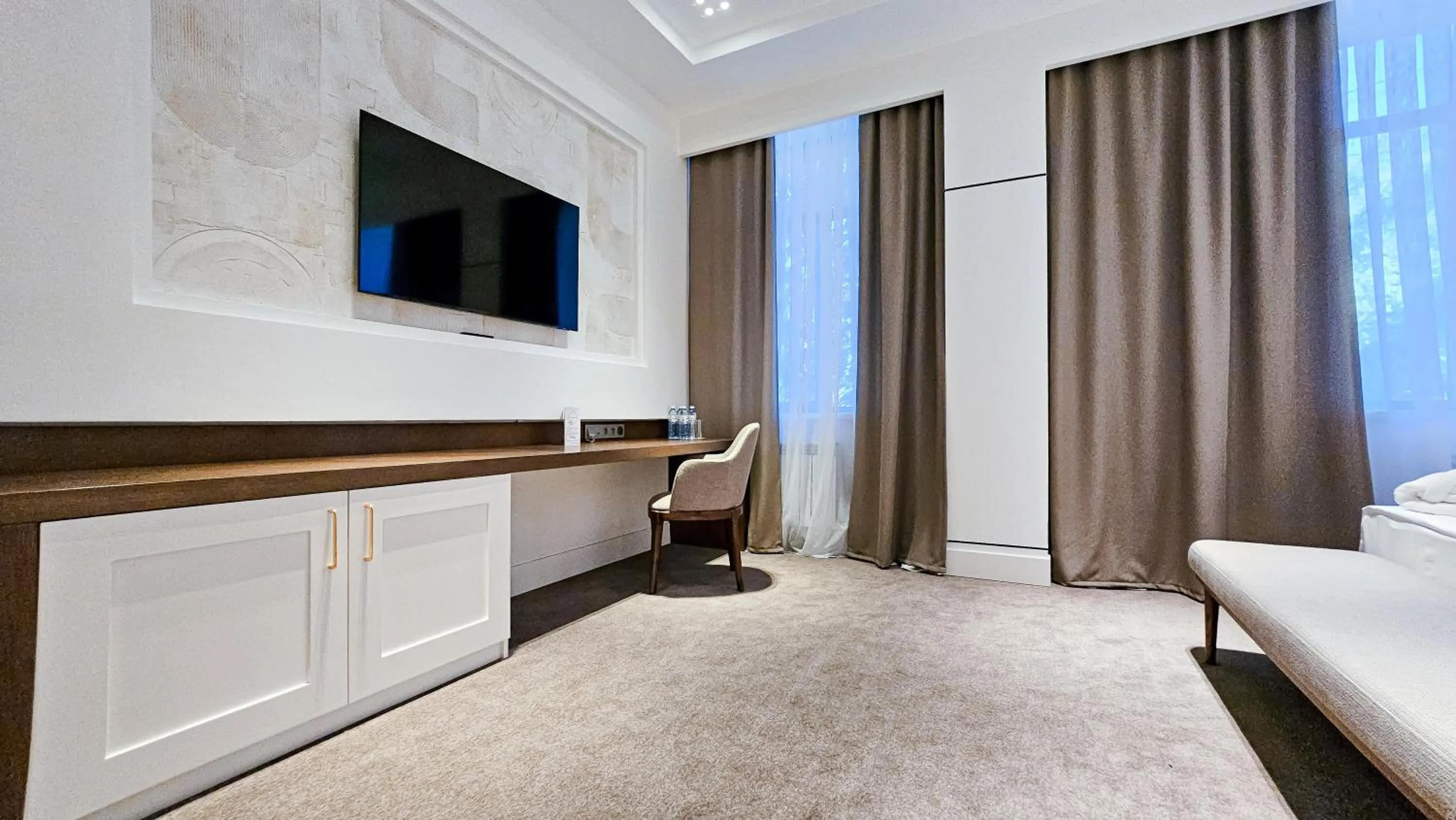 Bed in Grand Tien Shan Hotel