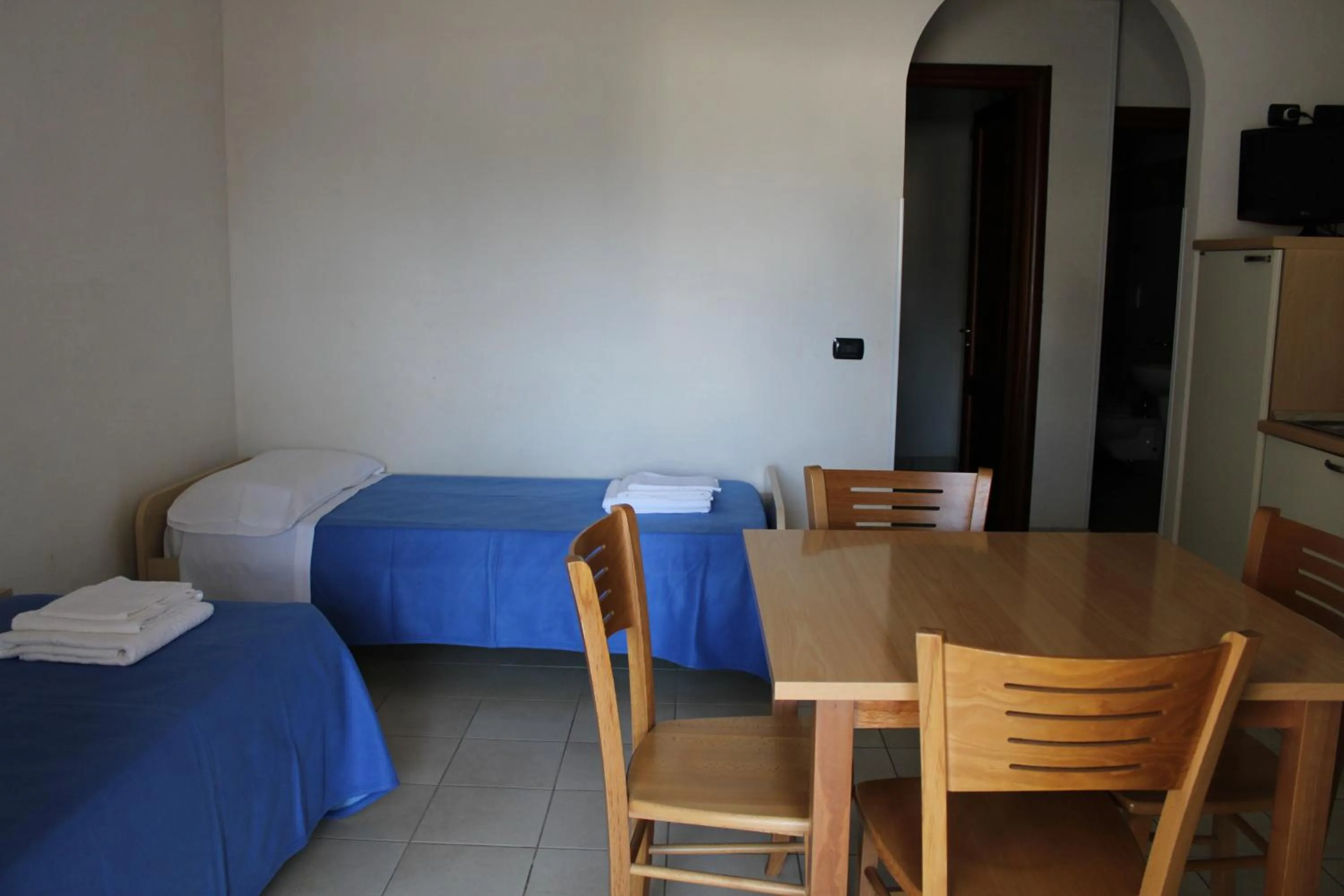 Living room, Bed in Residence - Blu Mare Alimini