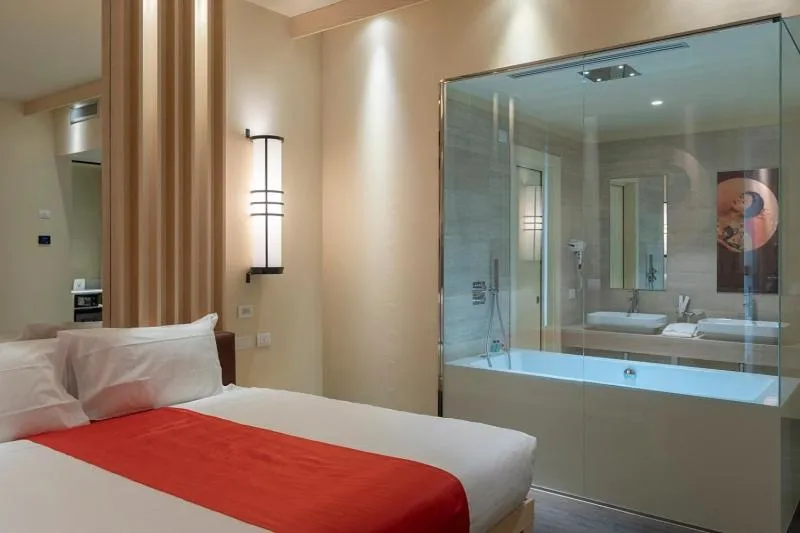 Bed in Emotional Grand Motel