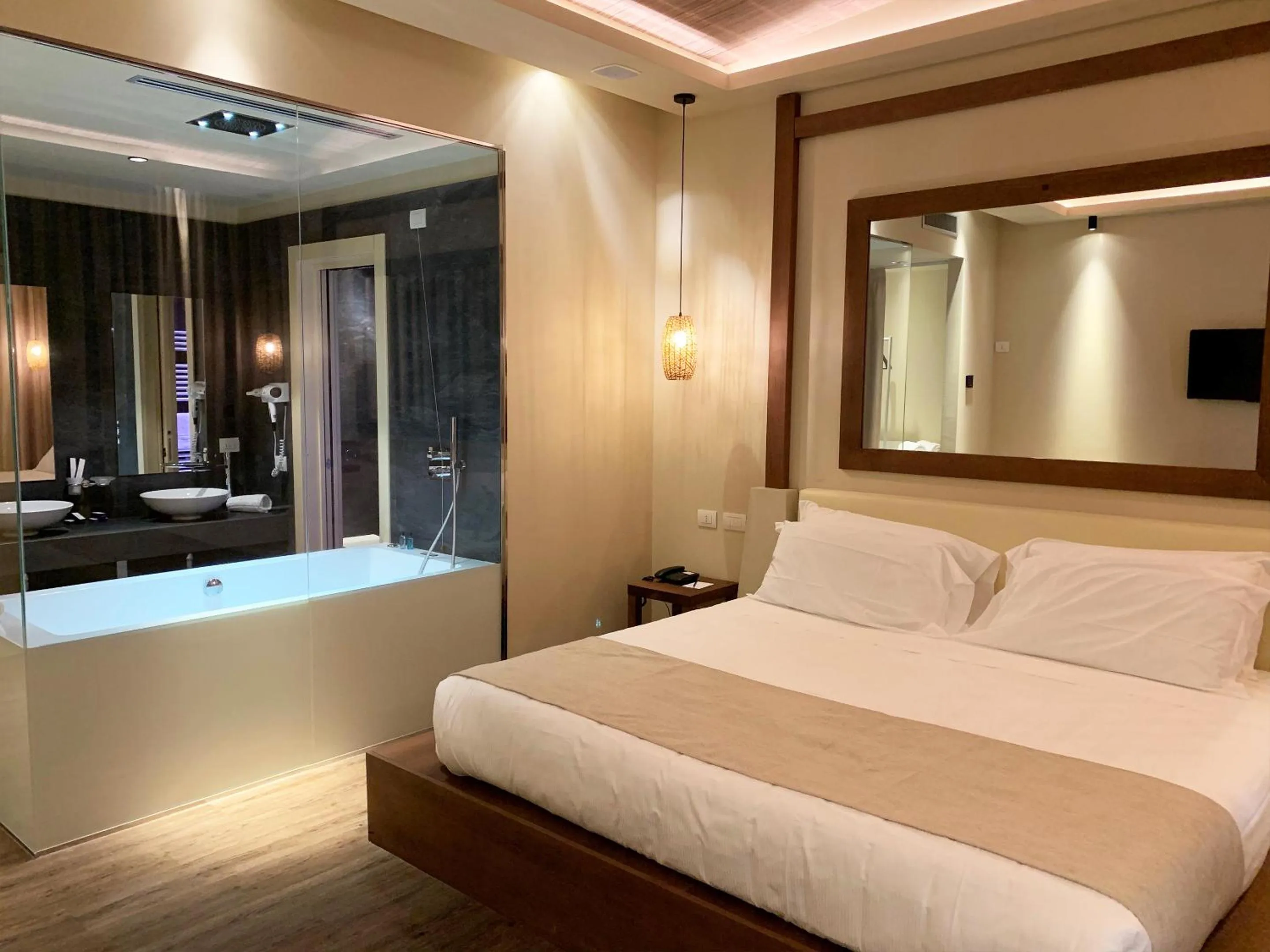 Photo of the whole room, Bed in Emotional Grand Motel