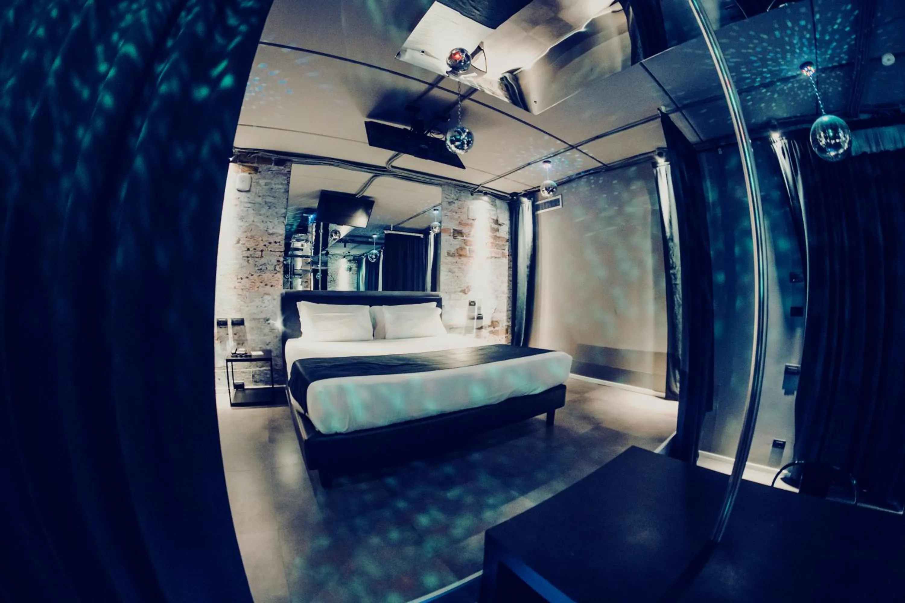 Bed in Emotional Grand Motel