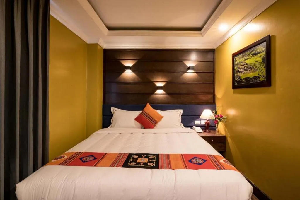 Bed in Nomadtrails Boutique Sapa Hotel
