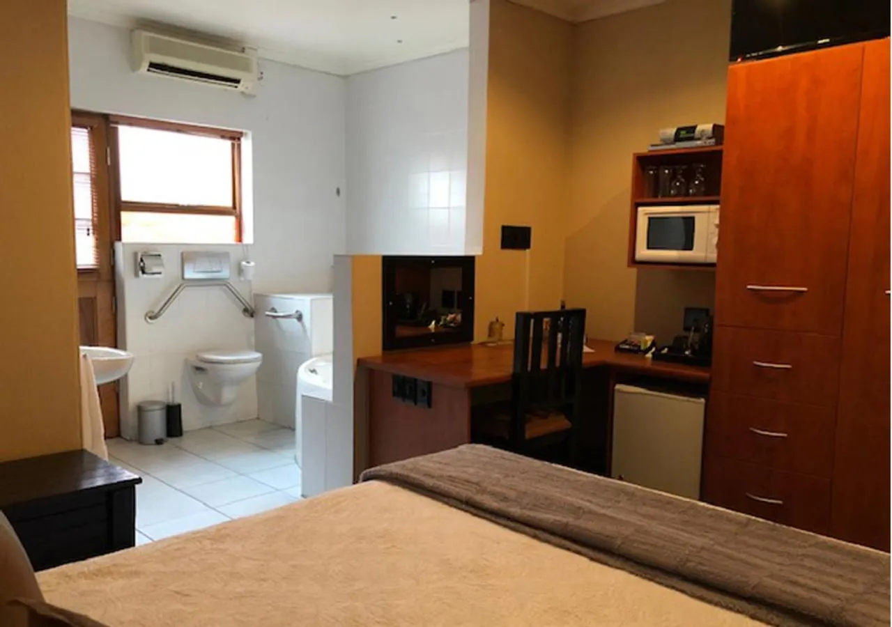 Photo of the whole room, Bed in A La Martha's Air-Port Guest House