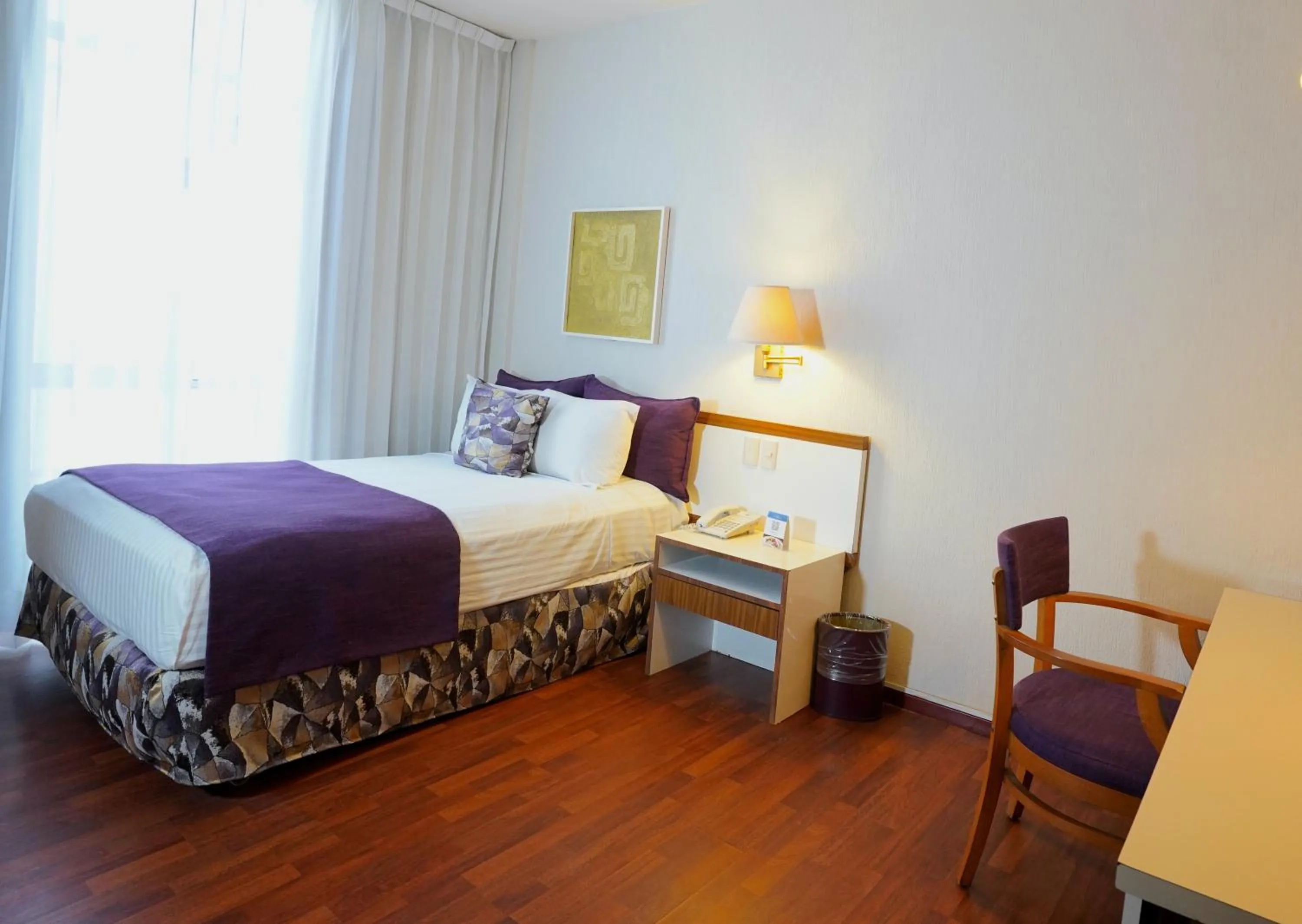 Decorative detail, Bed in Hotel San Marcos Express