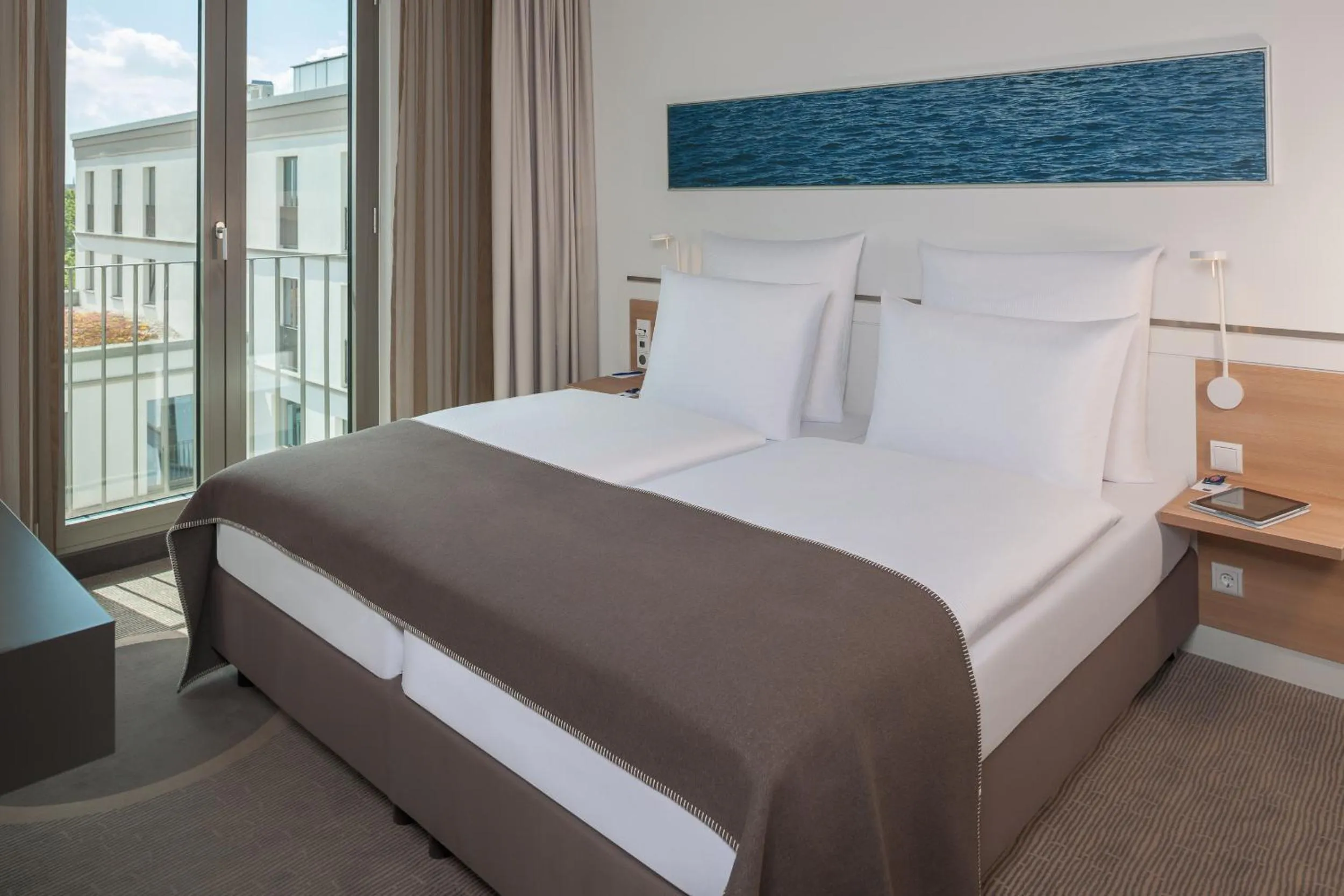 Bed in Dorint Hotel Hamburg-Eppendorf