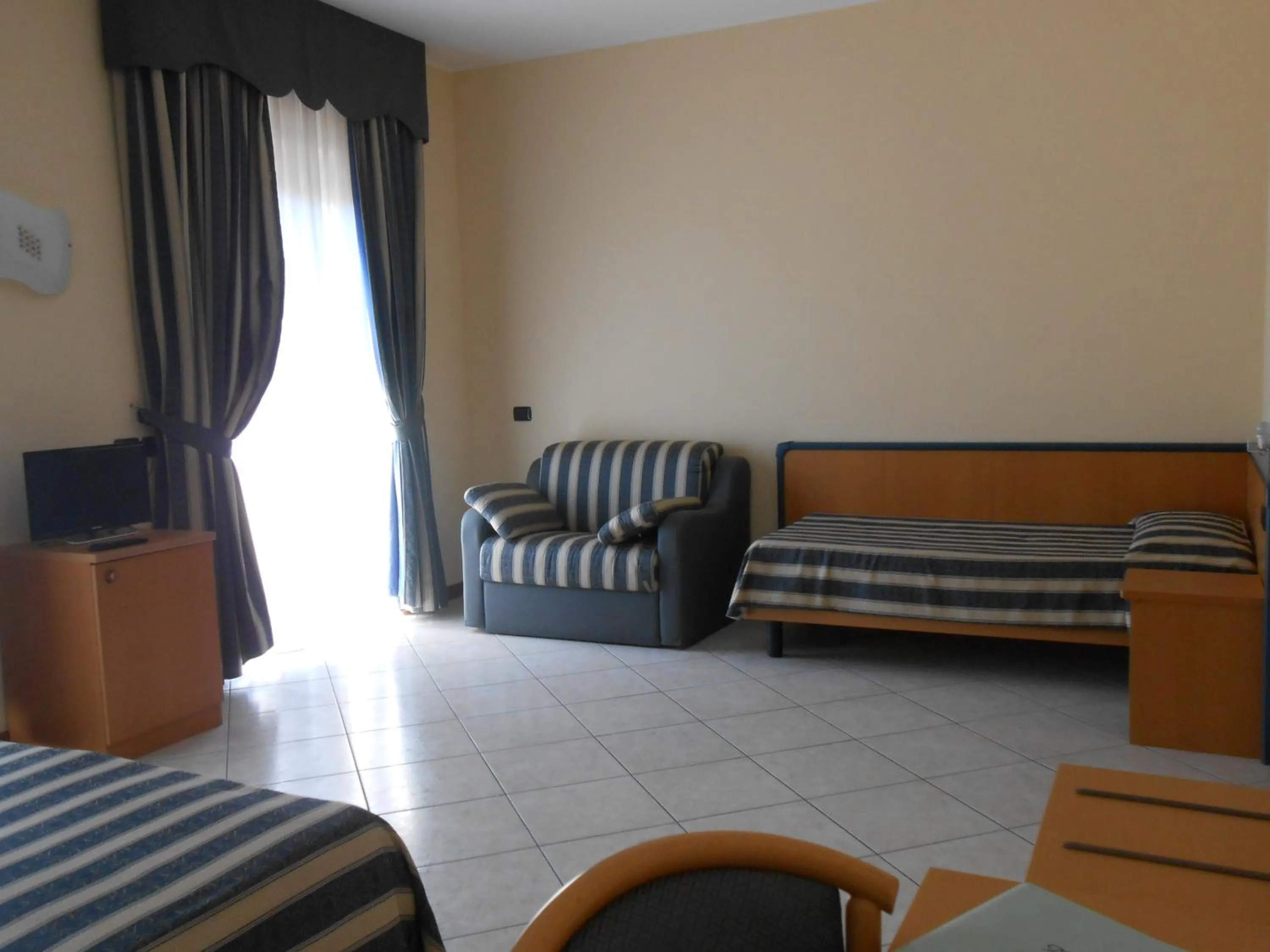 Photo of the whole room, Bed in Albergo Villa Eva