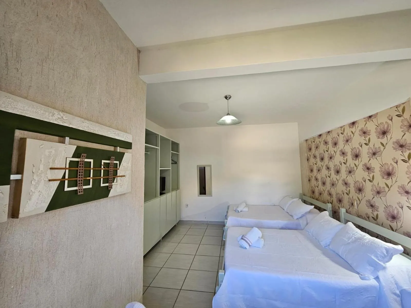 Bed in Pousada Recanto Das Emerências