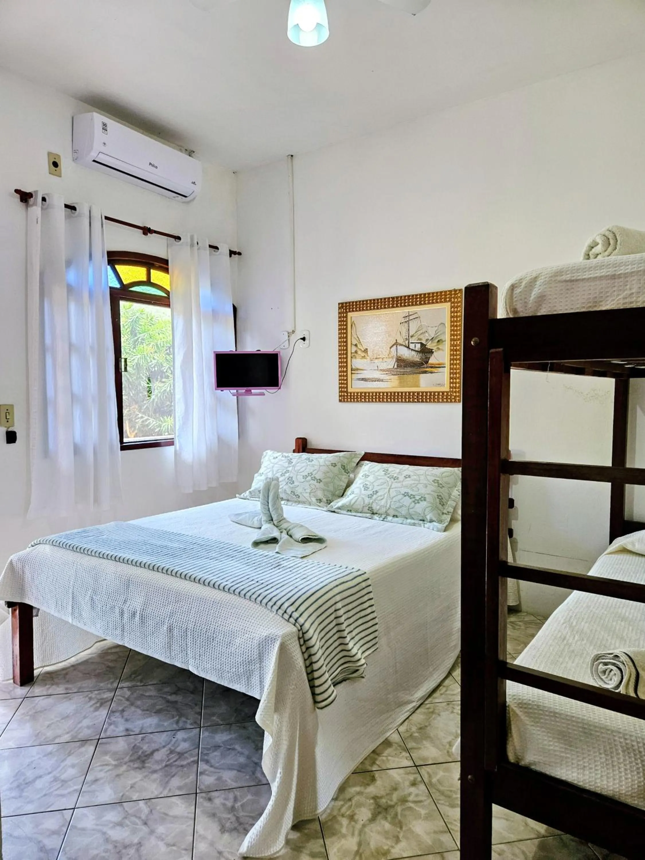 Bed in Pousada Recanto Das Emerências