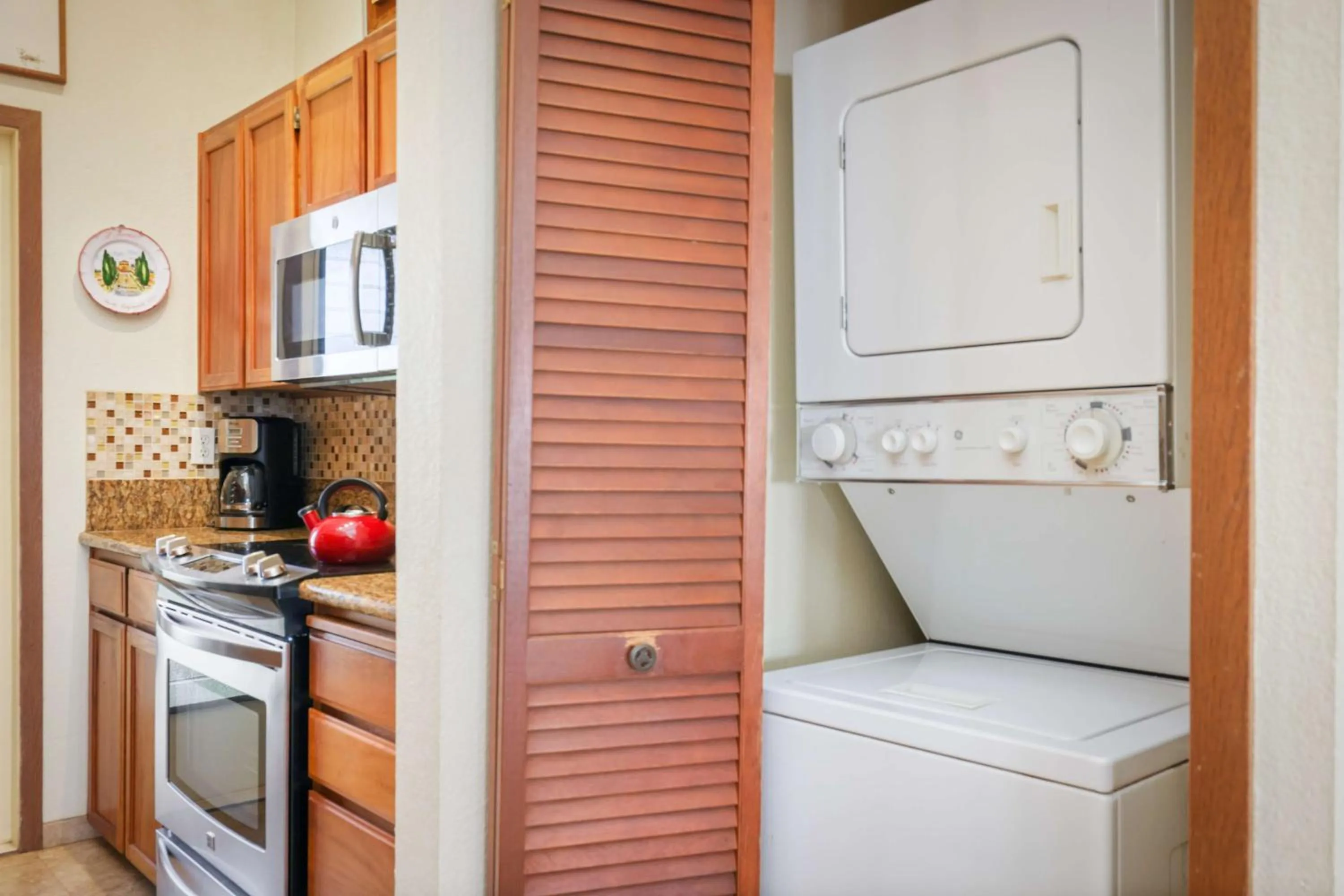 Kitchen or kitchenette in Aston Maui Hill