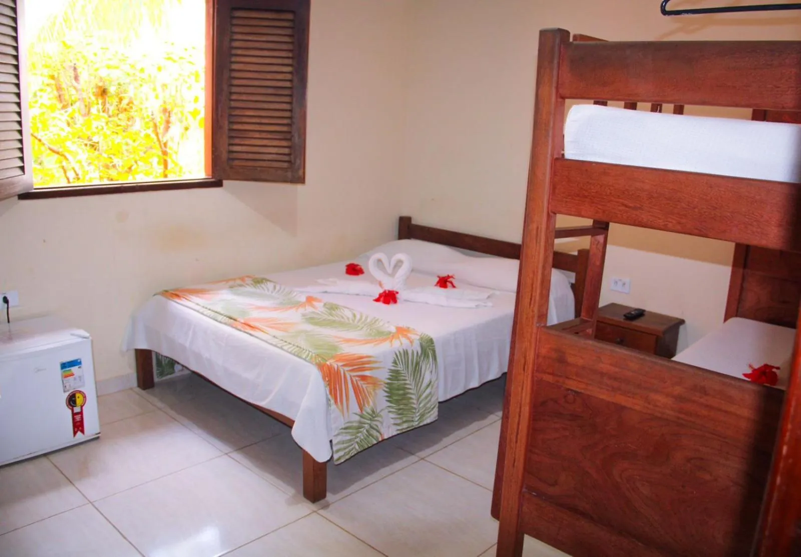 Photo of the whole room, Bed in Pousada Hibiscus