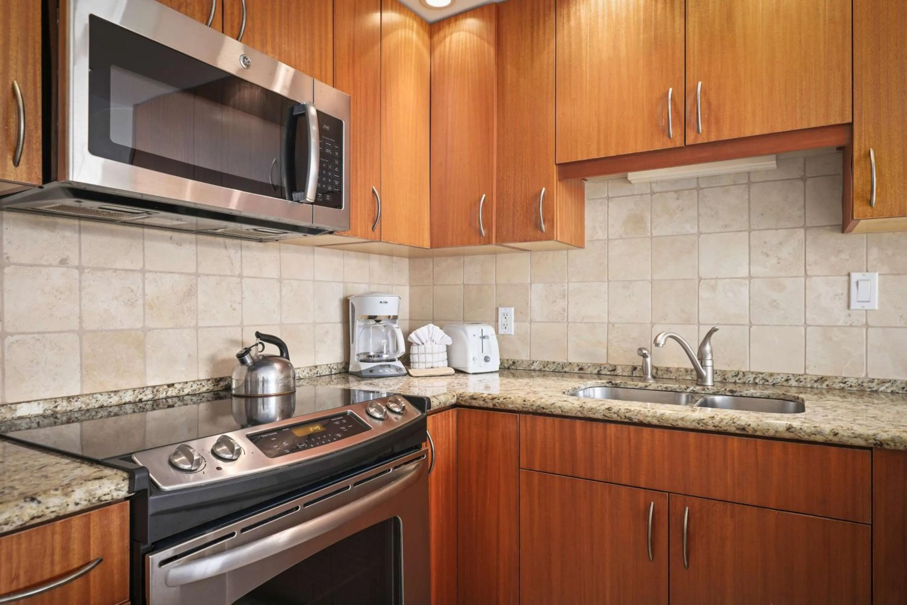 Kitchen or kitchenette in Aston at Papakea Resort