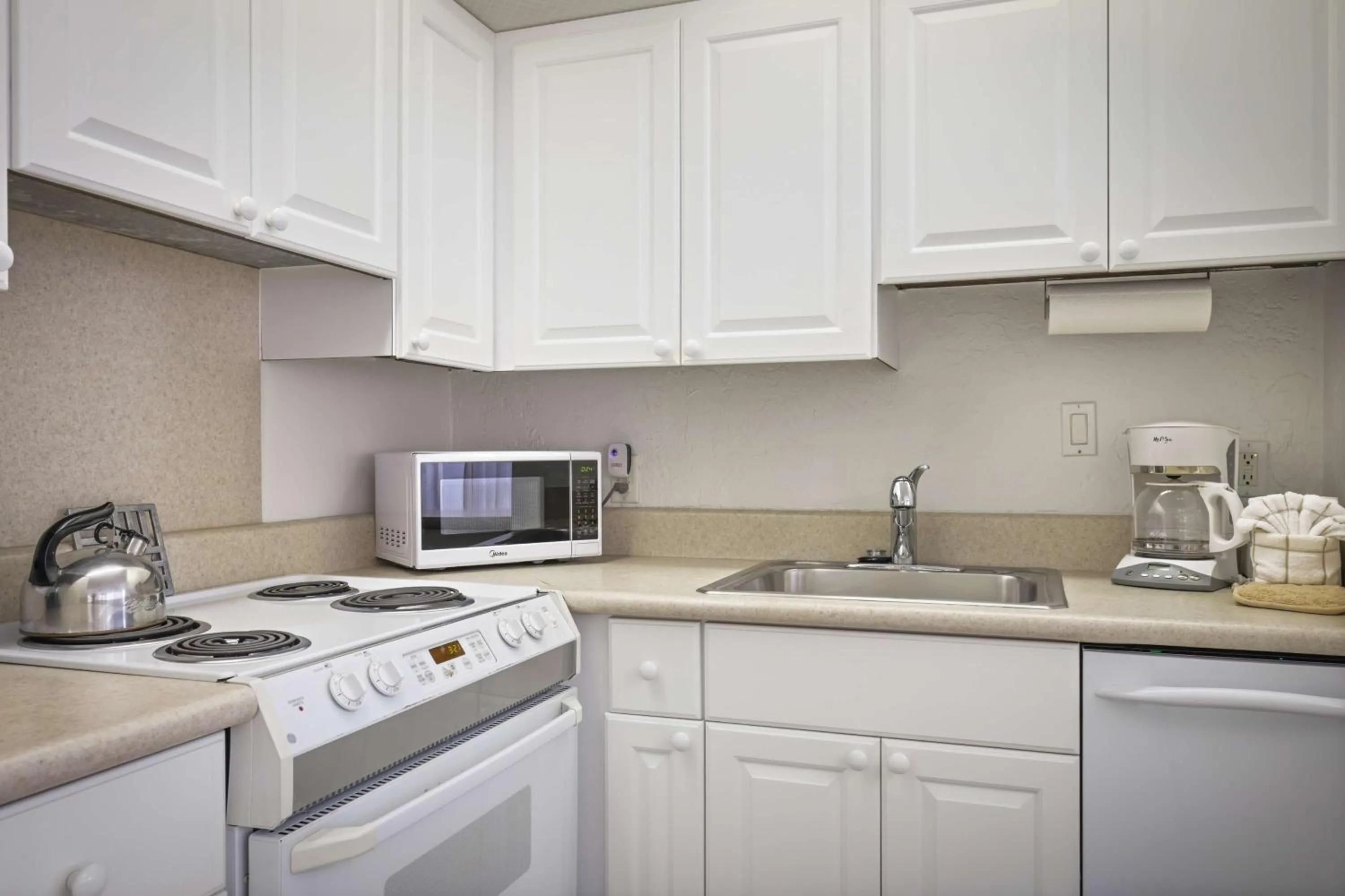 Kitchen or kitchenette in Aston at Papakea Resort