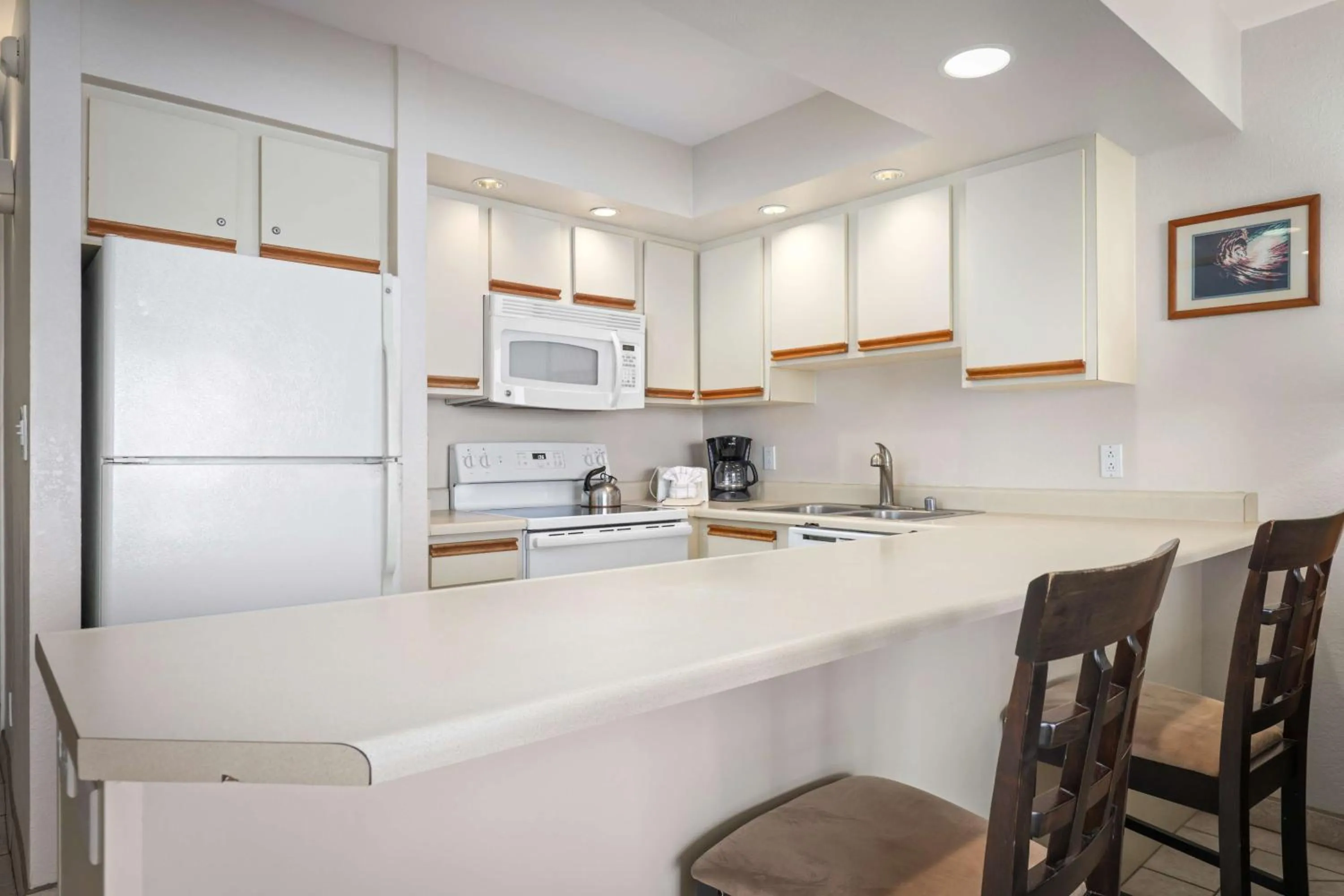 Kitchen or kitchenette in Aston at Papakea Resort