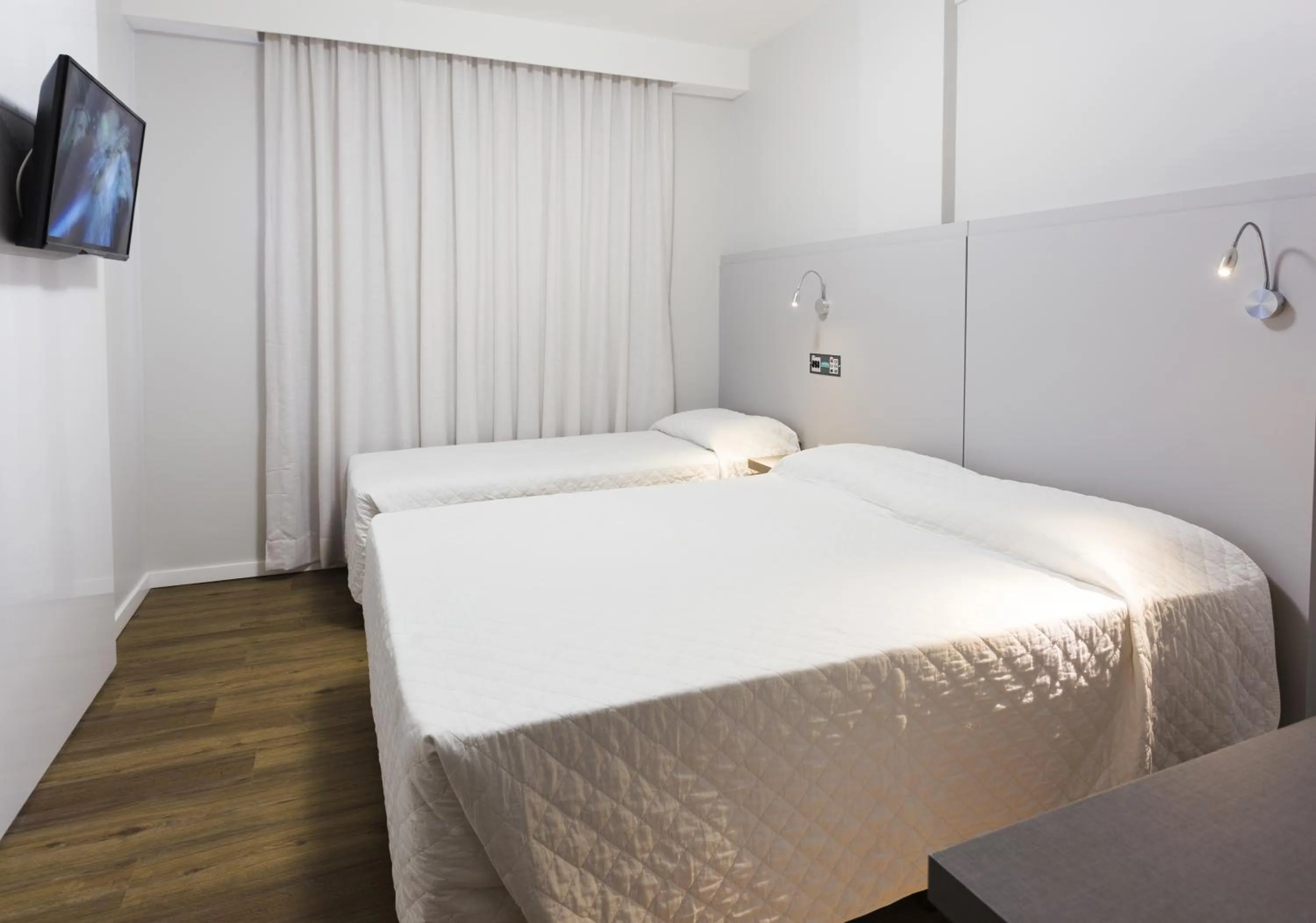 Bed in Tropikalya Prime Hotel