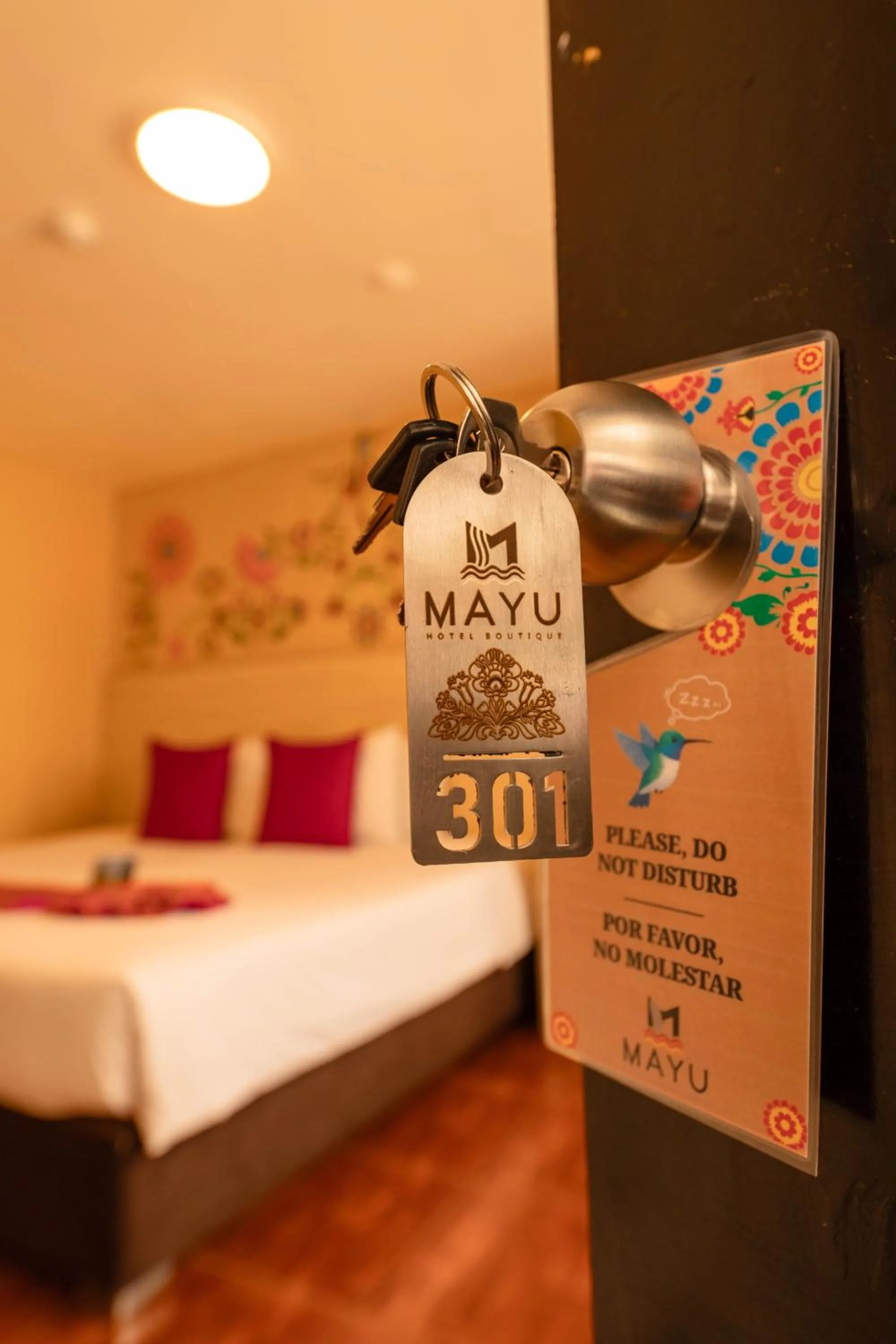 Bed in Mayu Boutique Hotel