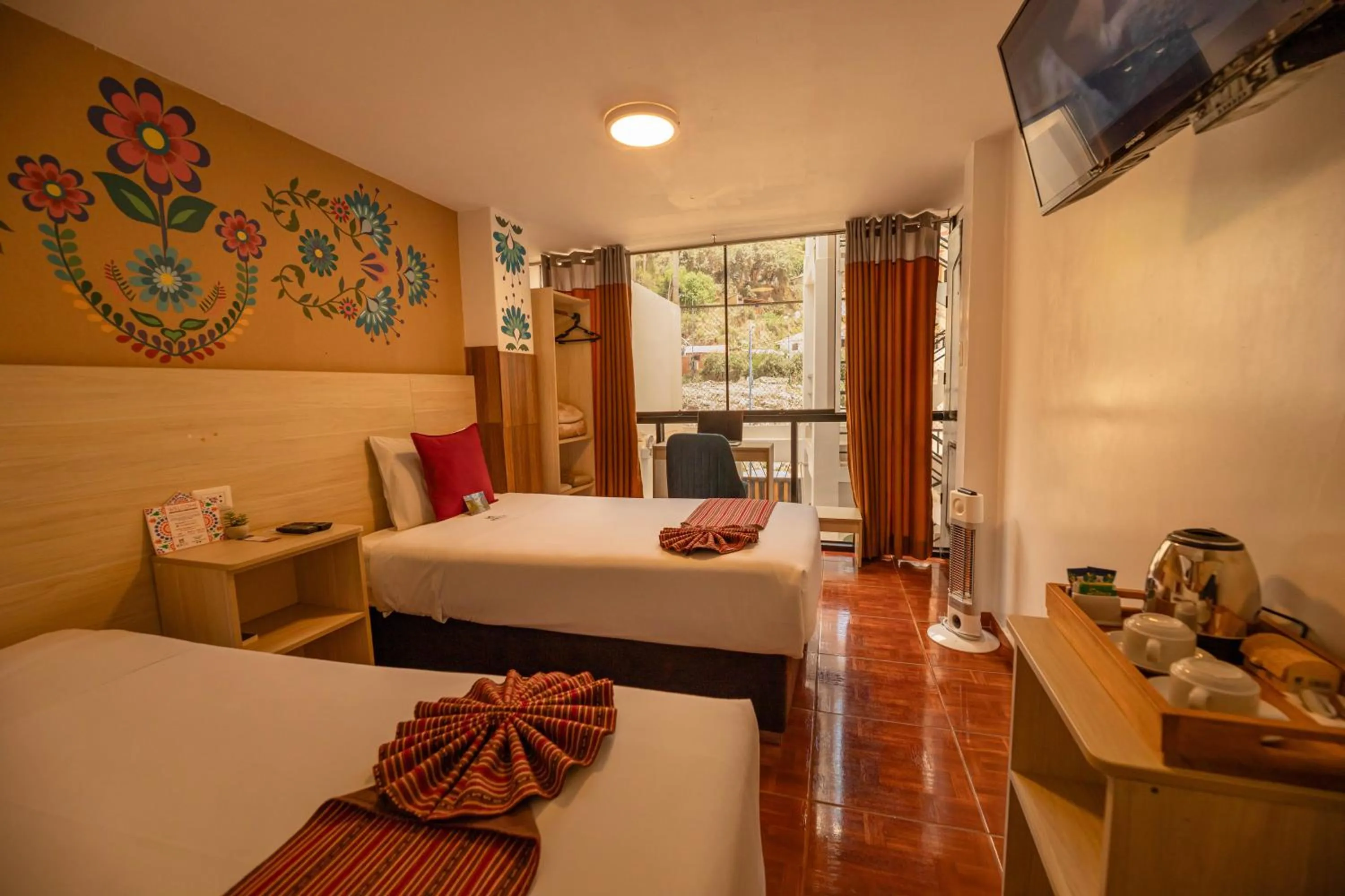 Bed in Mayu Boutique Hotel