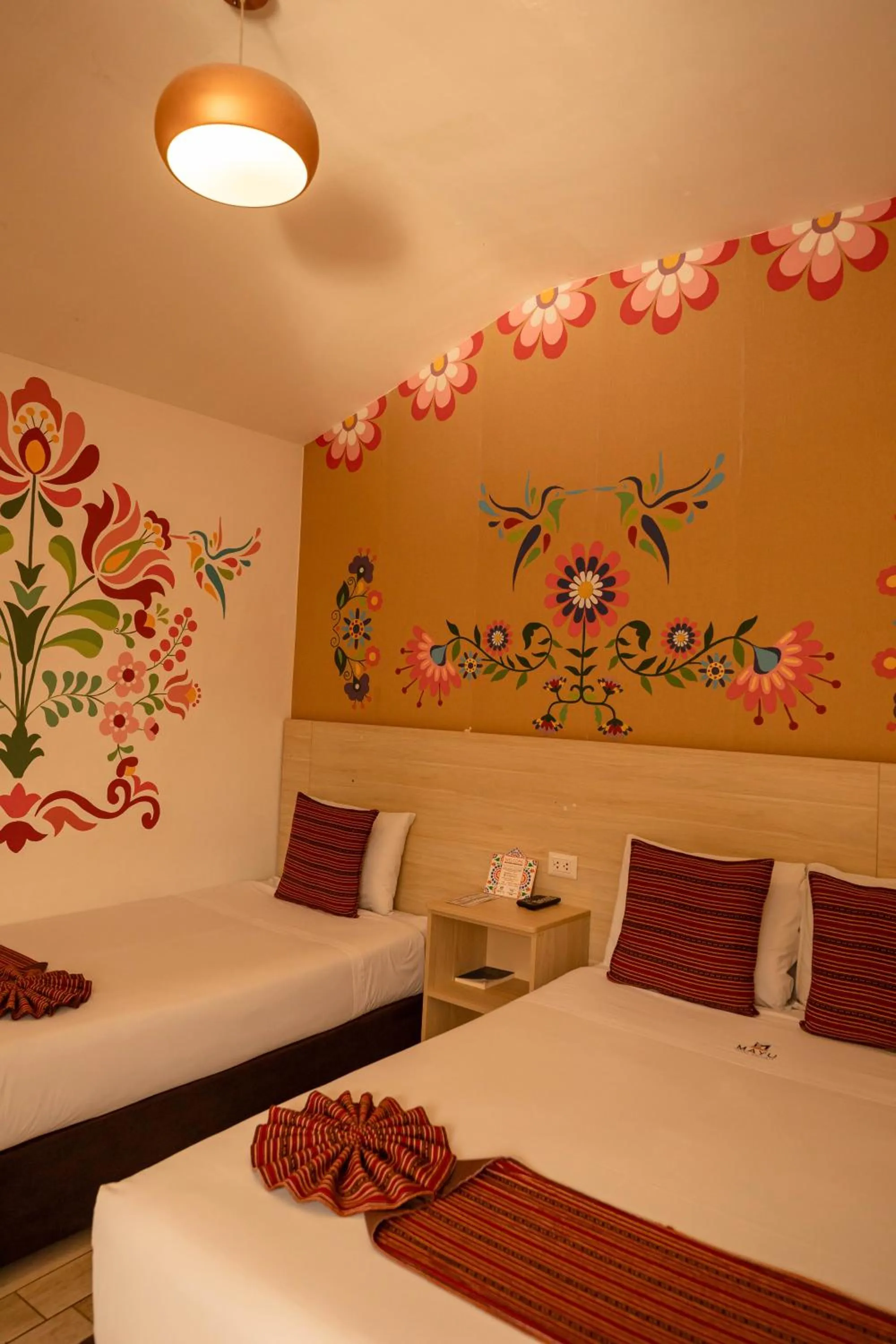 Bed in Mayu Boutique Hotel