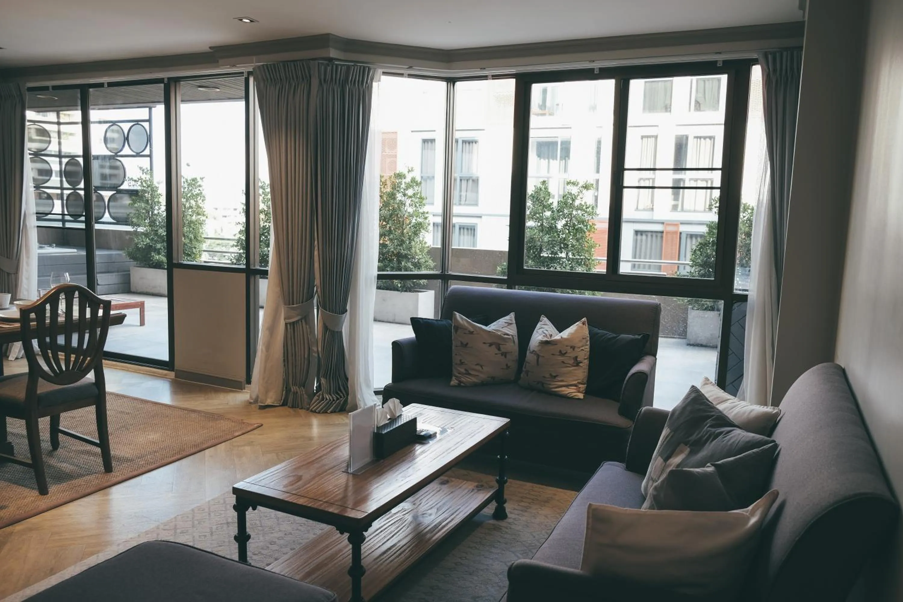 Living room in THEA Private Suites by TH District