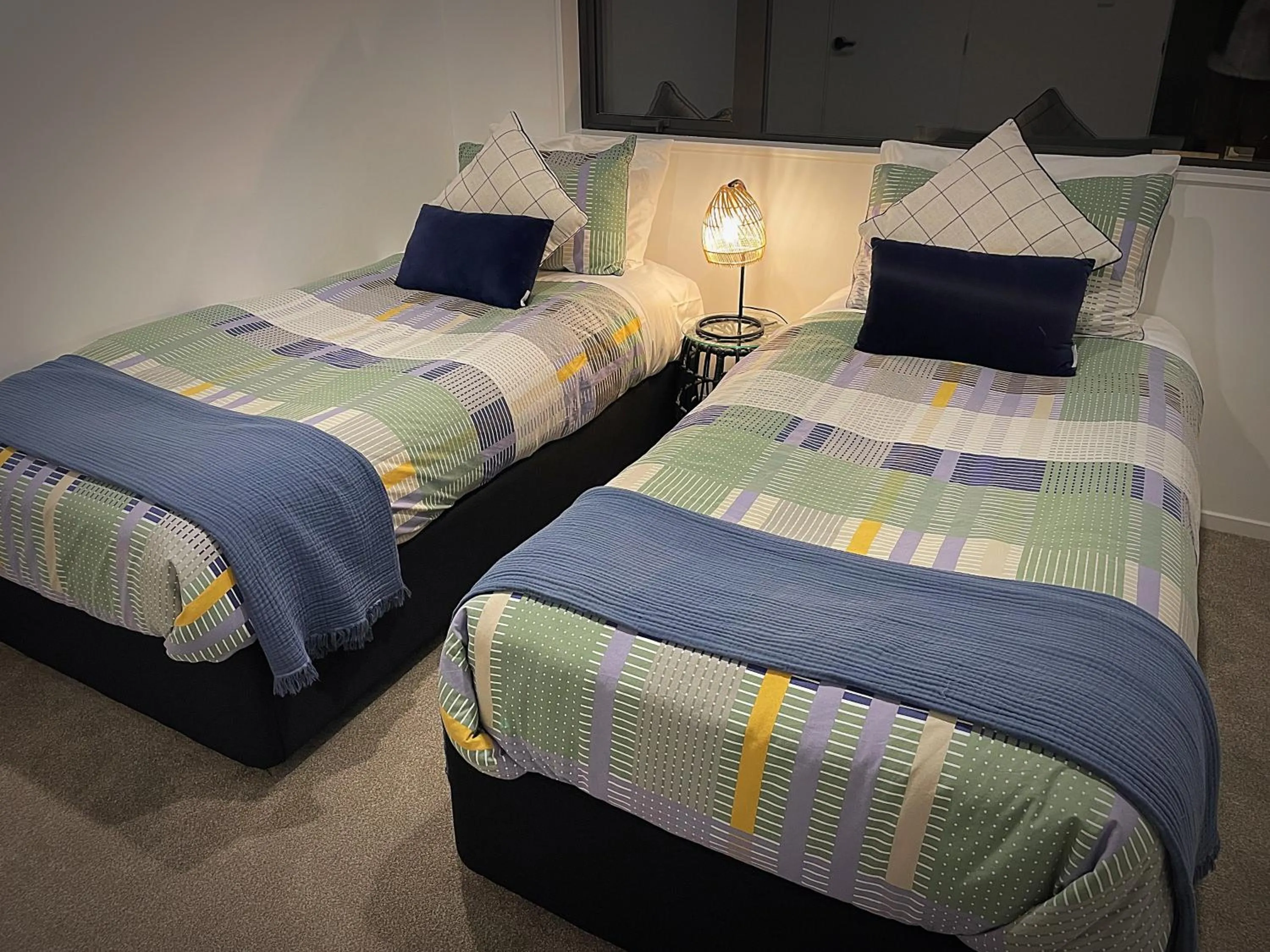 Bed in Flat Bush Holiday Accommodation