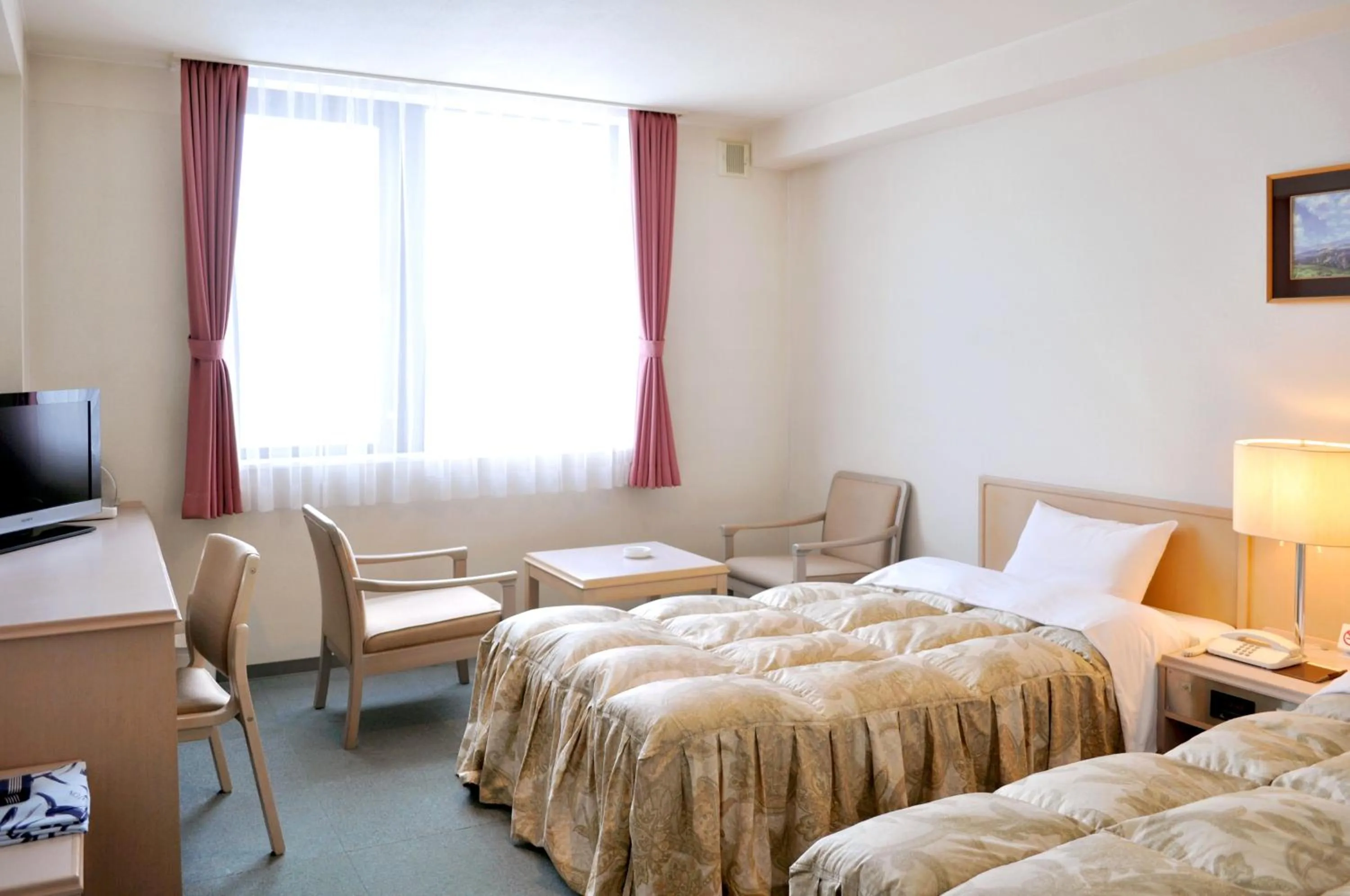 Photo of the whole room, Bed in Hotel Sunfuraton