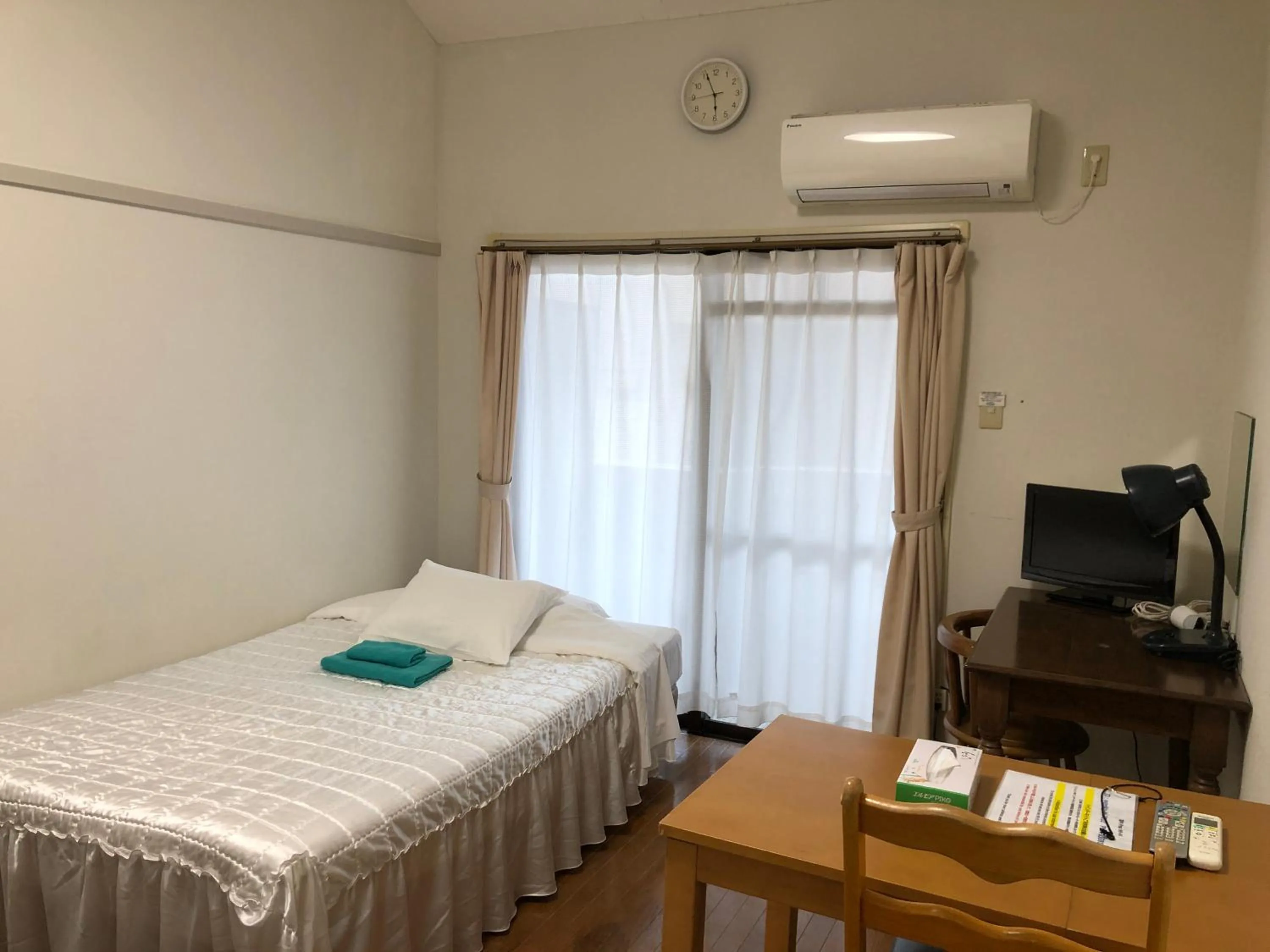 Bed in Weekly Harbourview Mansion Main Building