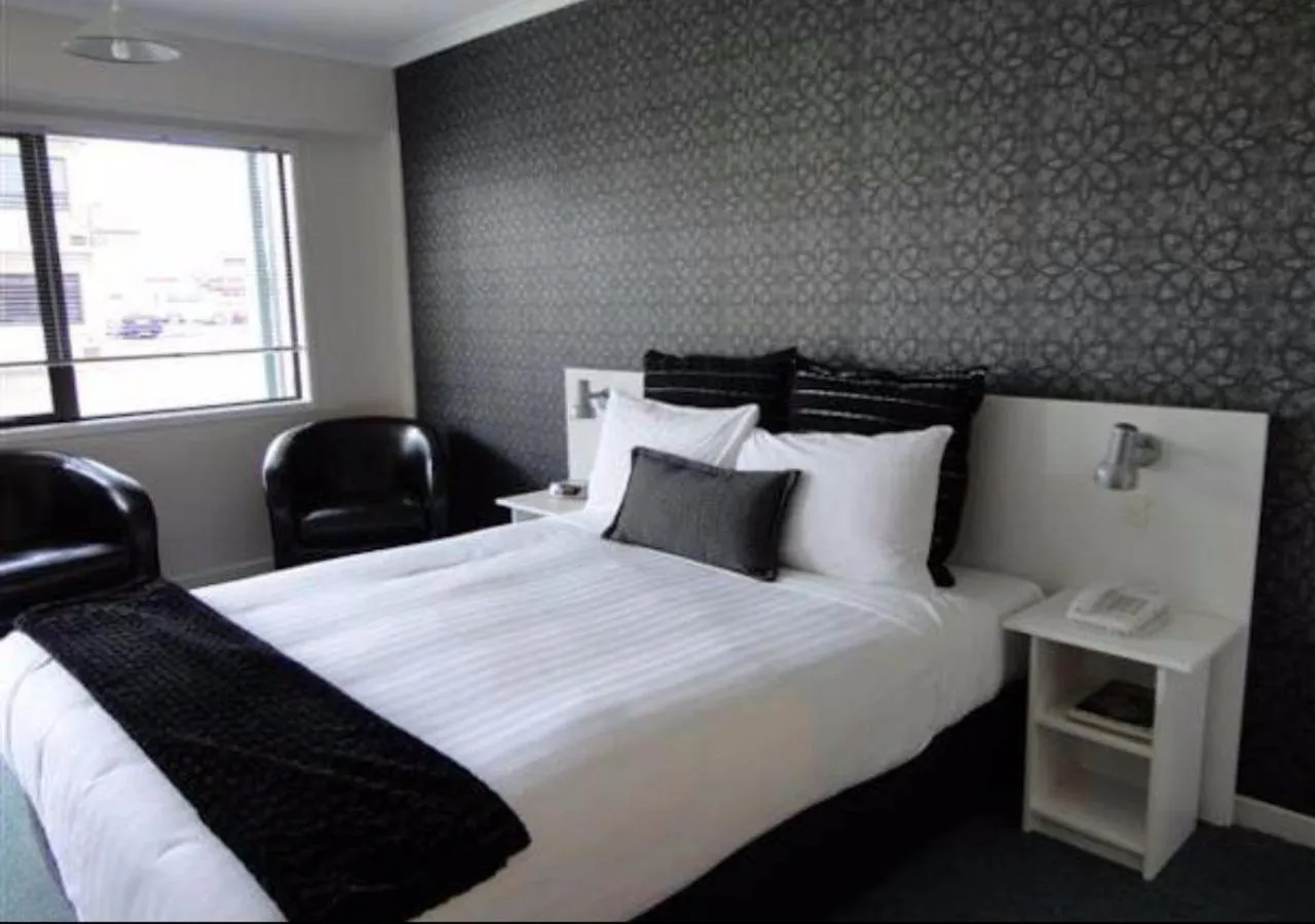 Bed in ASURE Abode On Courtenay Motor Inn