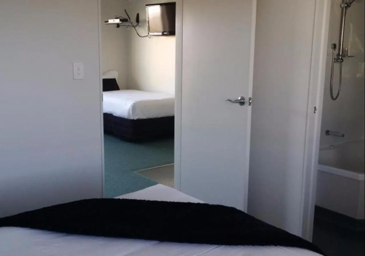 Bedroom, Bed in ASURE Abode On Courtenay Motor Inn