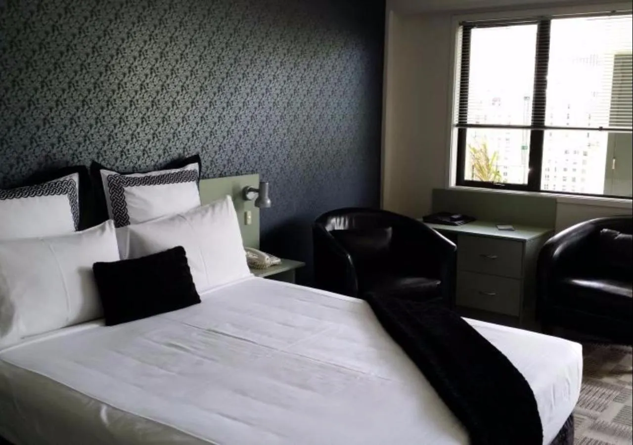 Bed in ASURE Abode On Courtenay Motor Inn