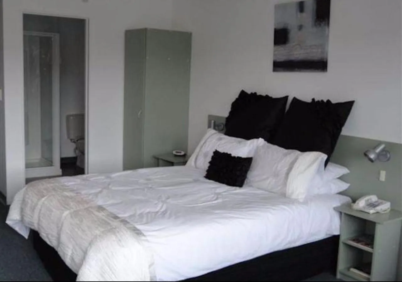 Bed in ASURE Abode On Courtenay Motor Inn