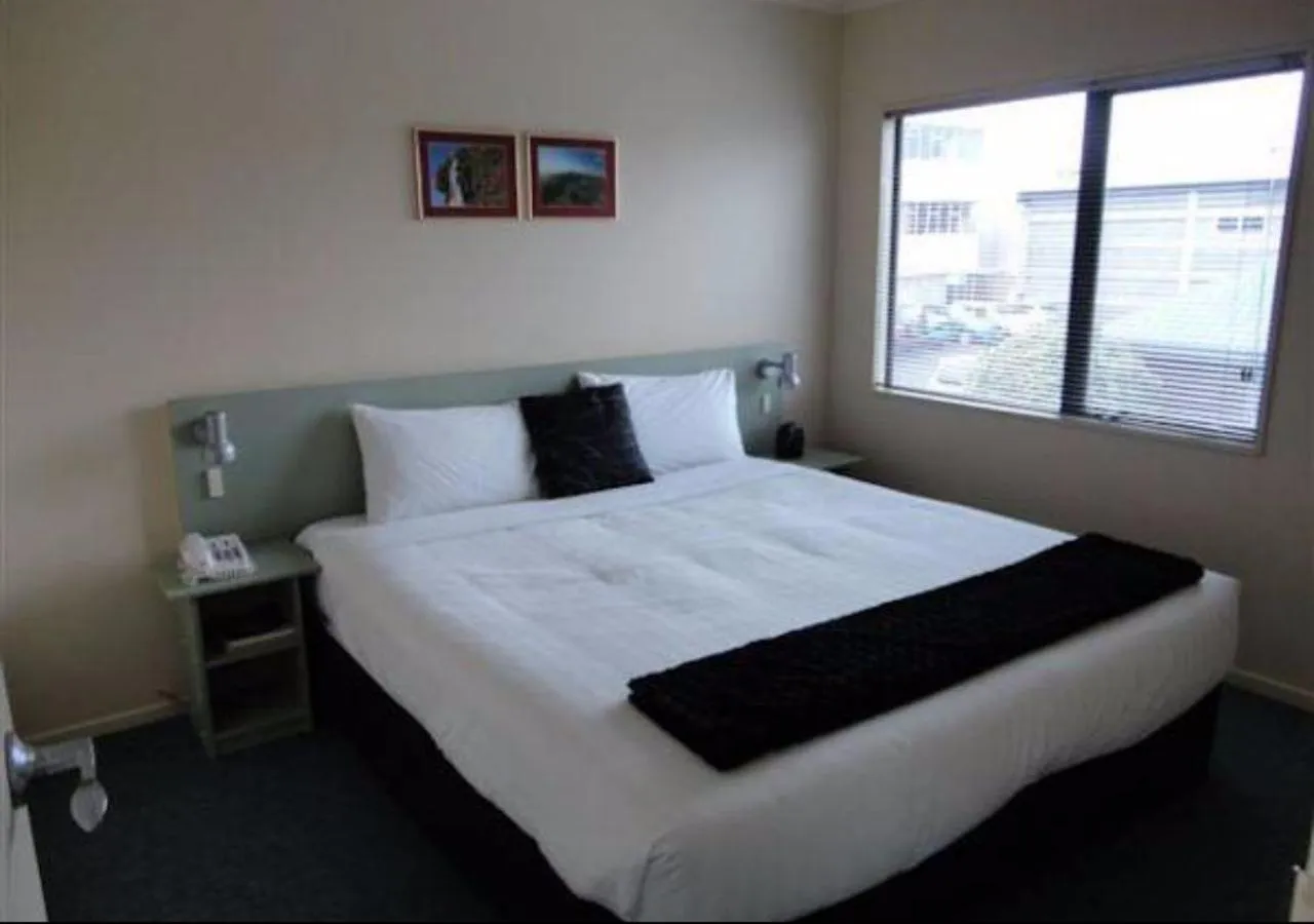 Bed in ASURE Abode On Courtenay Motor Inn