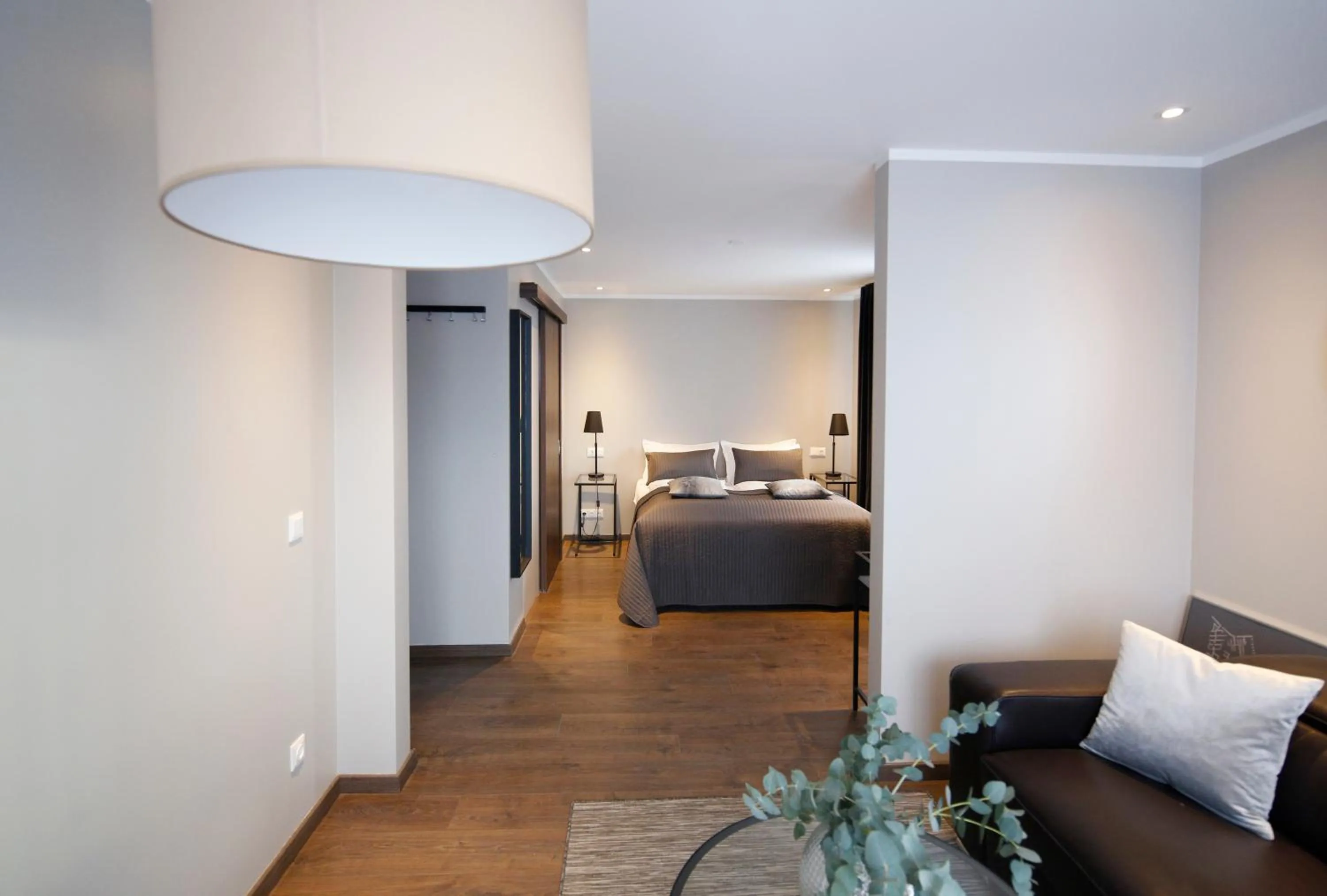Living room, Bed in Keflavik Micro Suites