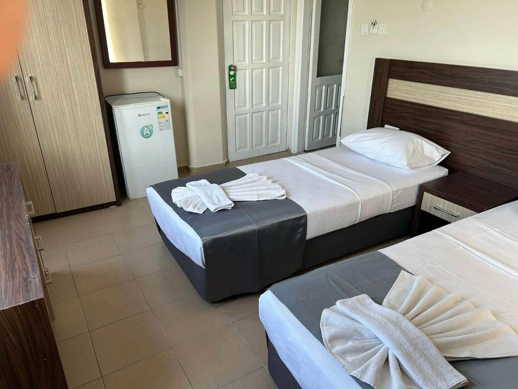 Bed in Rosella Hotel