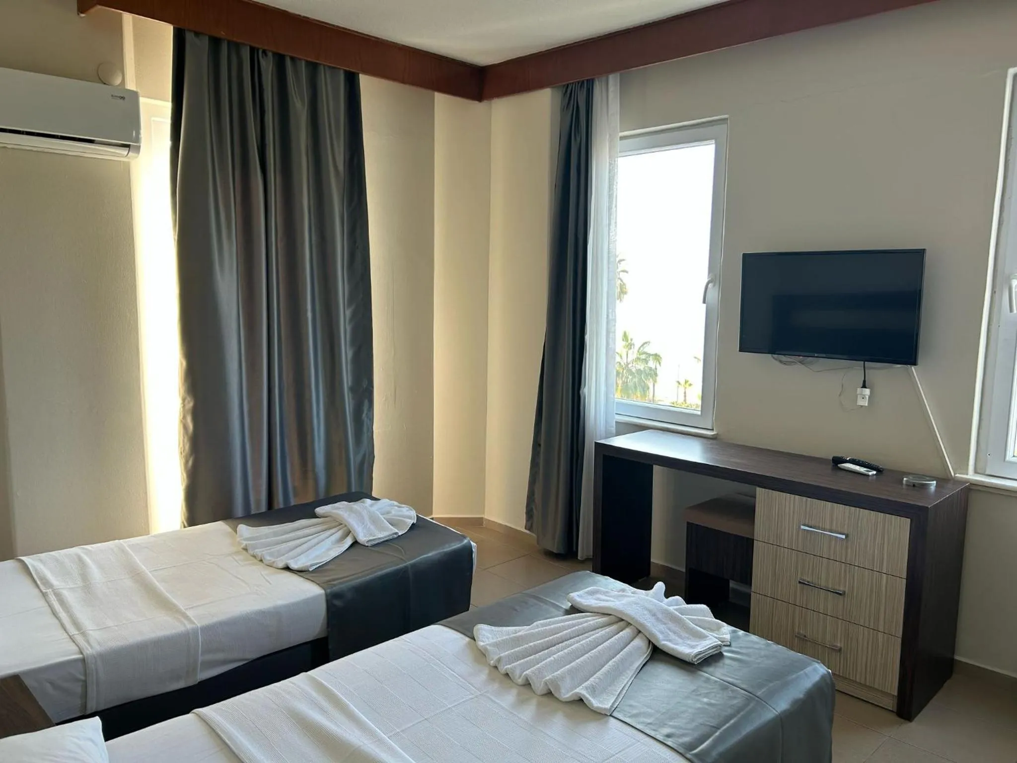 Bed in Rosella Hotel