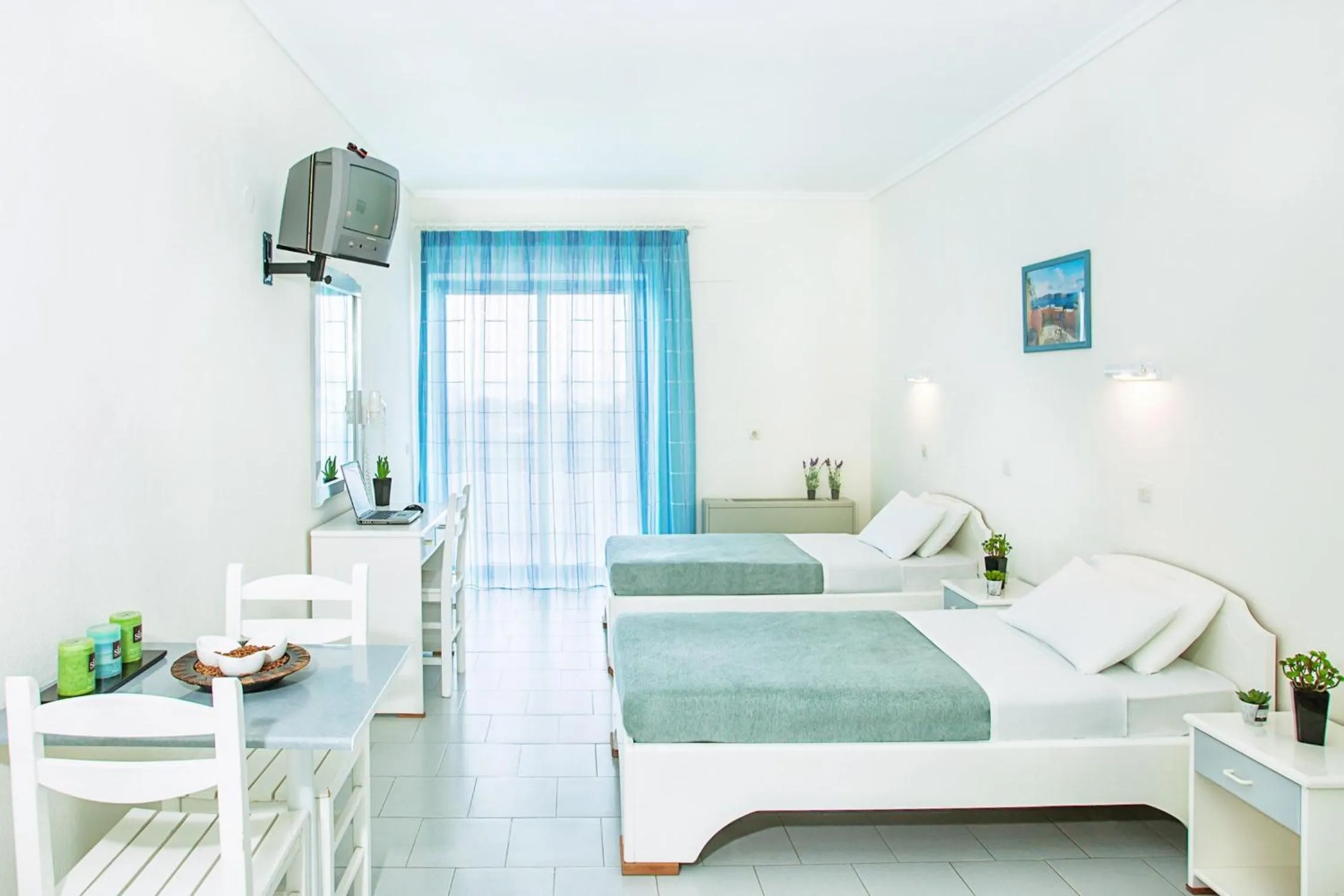 Photo of the whole room in Xenios Port Marina Hotel