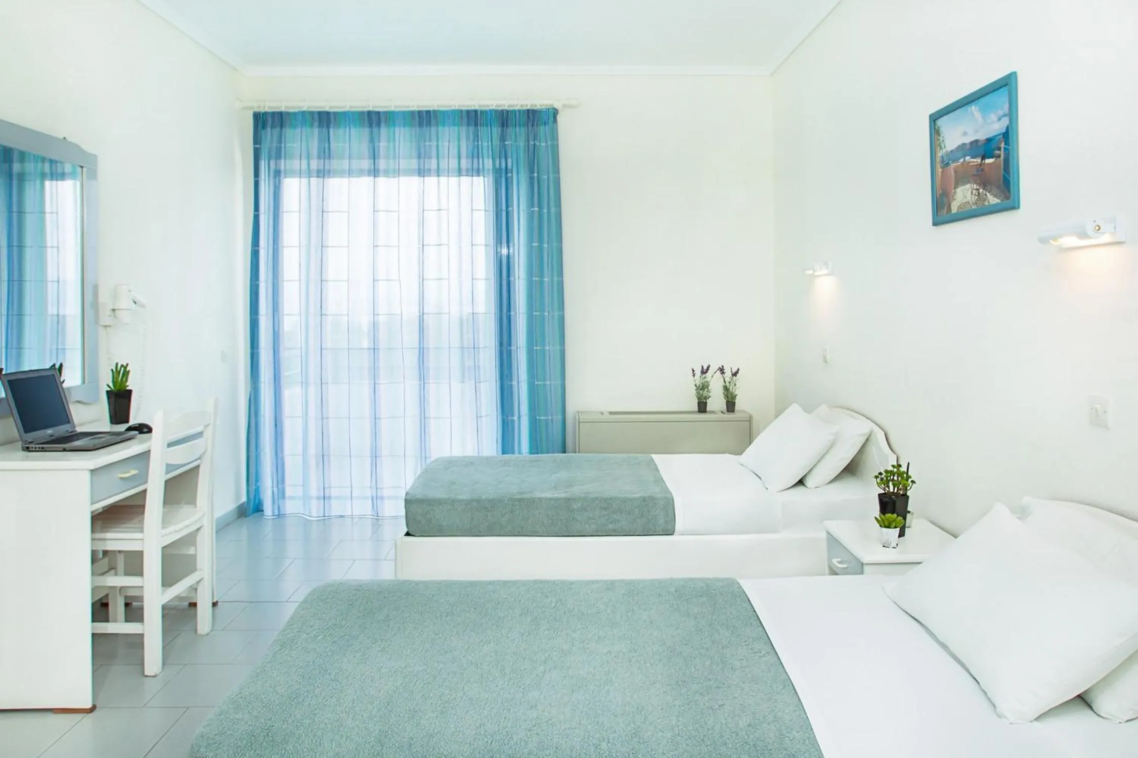 Photo of the whole room in Xenios Port Marina Hotel