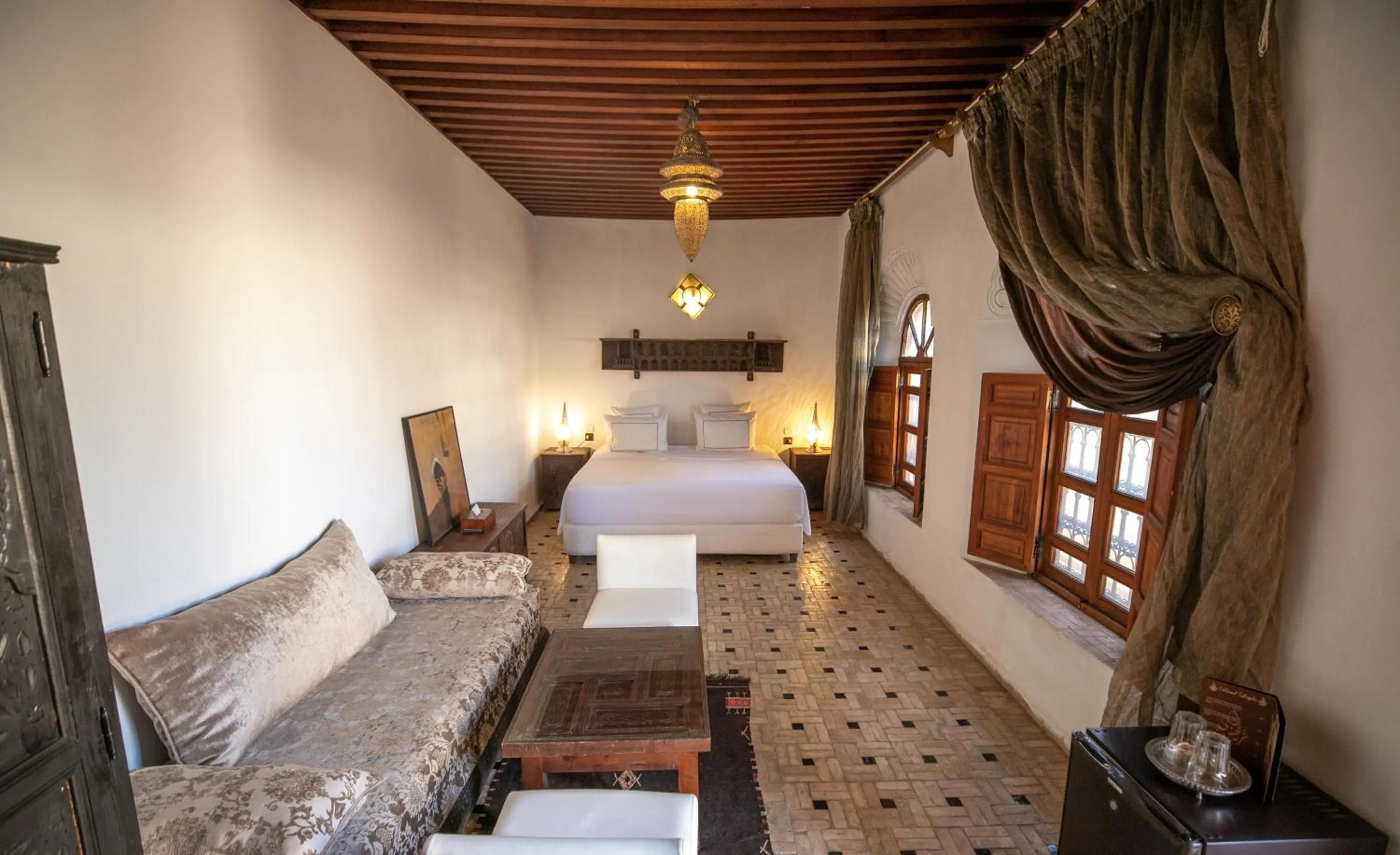 Living room, Bed in Riad Layla