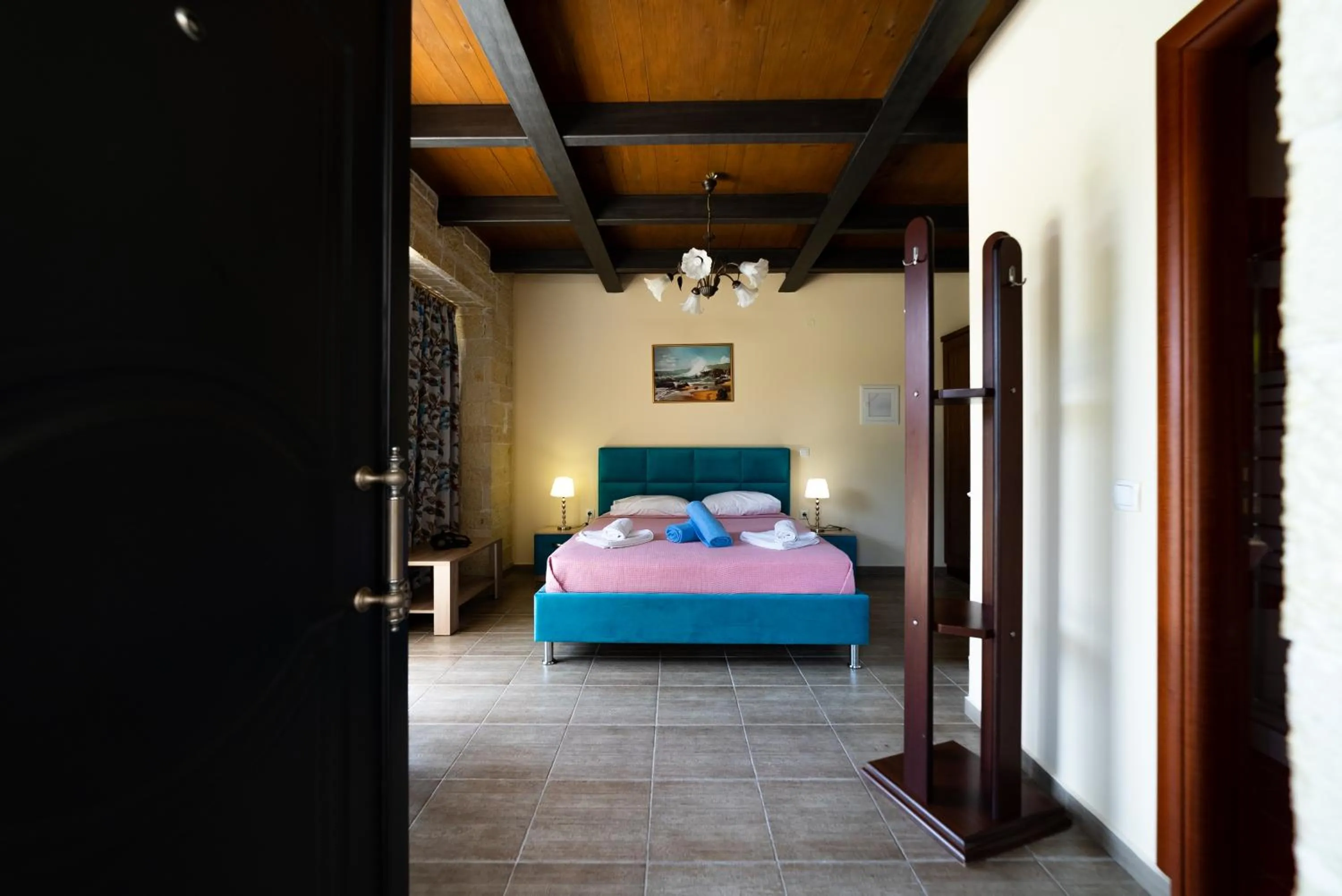 Bed in Ornella Beach Resort & Villas