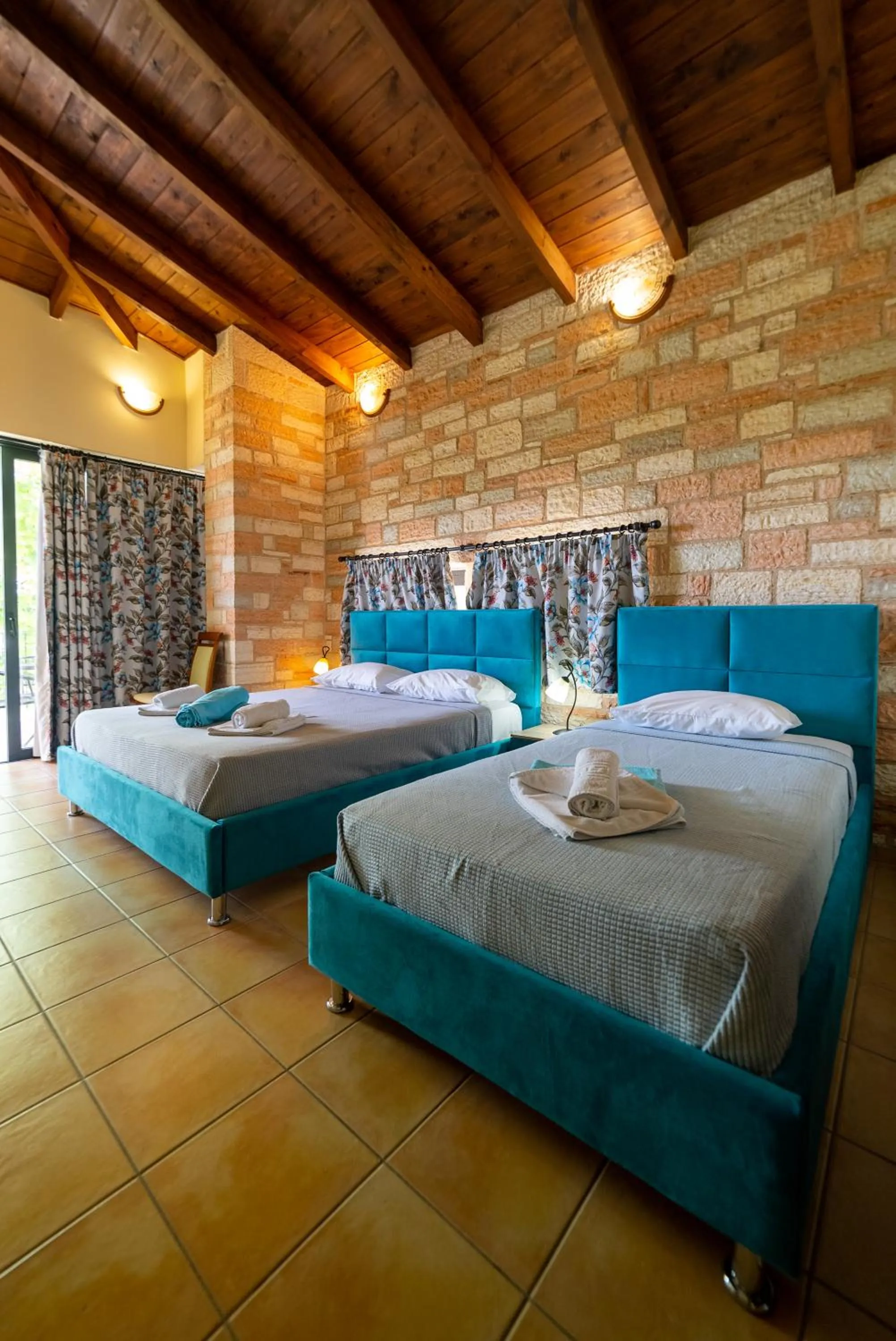 Bed in Ornella Beach Resort & Villas