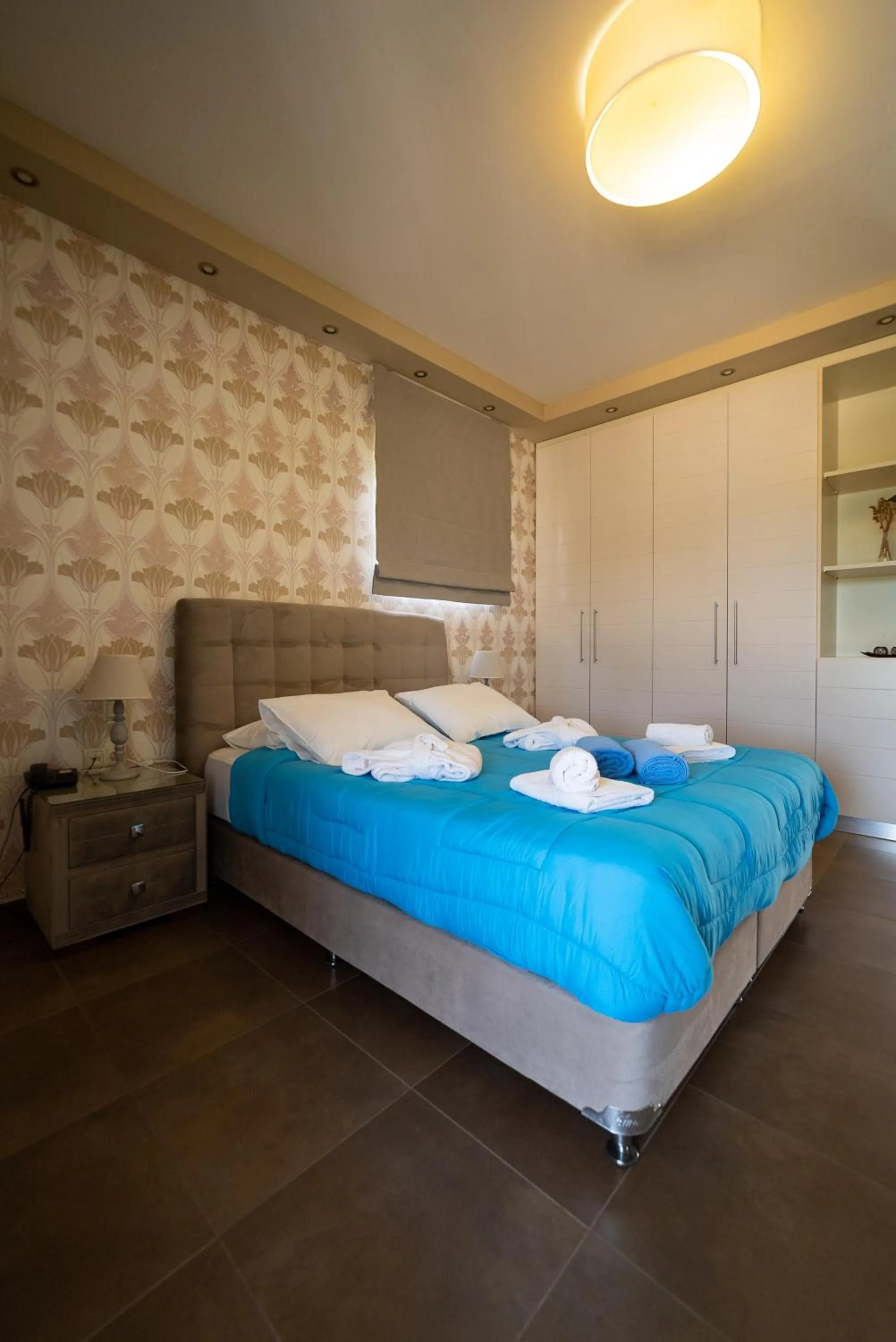 Bed in Ornella Beach Resort & Villas