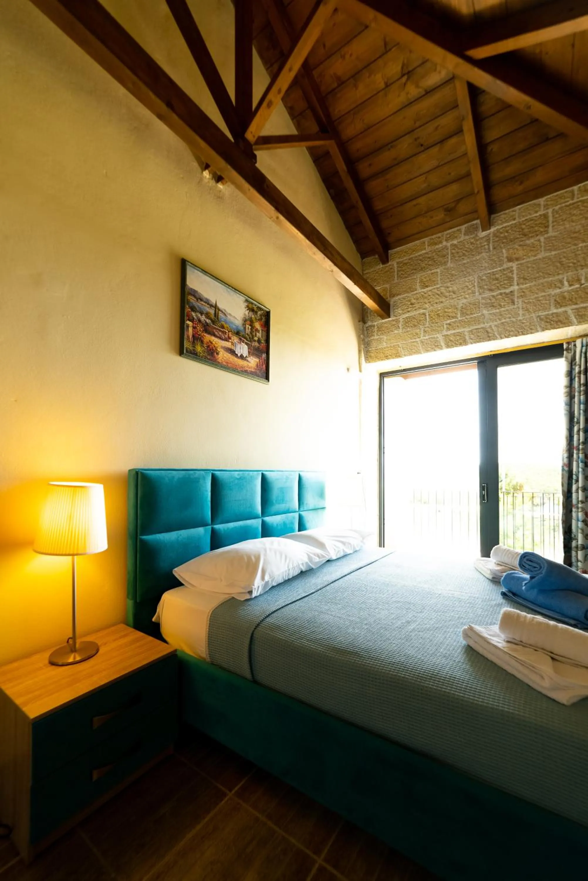 Bed in Ornella Beach Resort & Villas