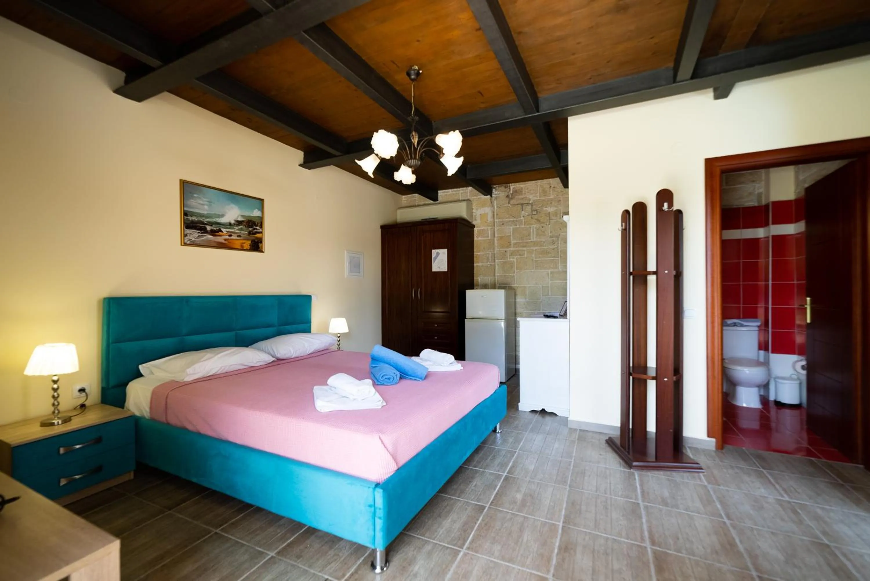Bed in Ornella Beach Resort & Villas