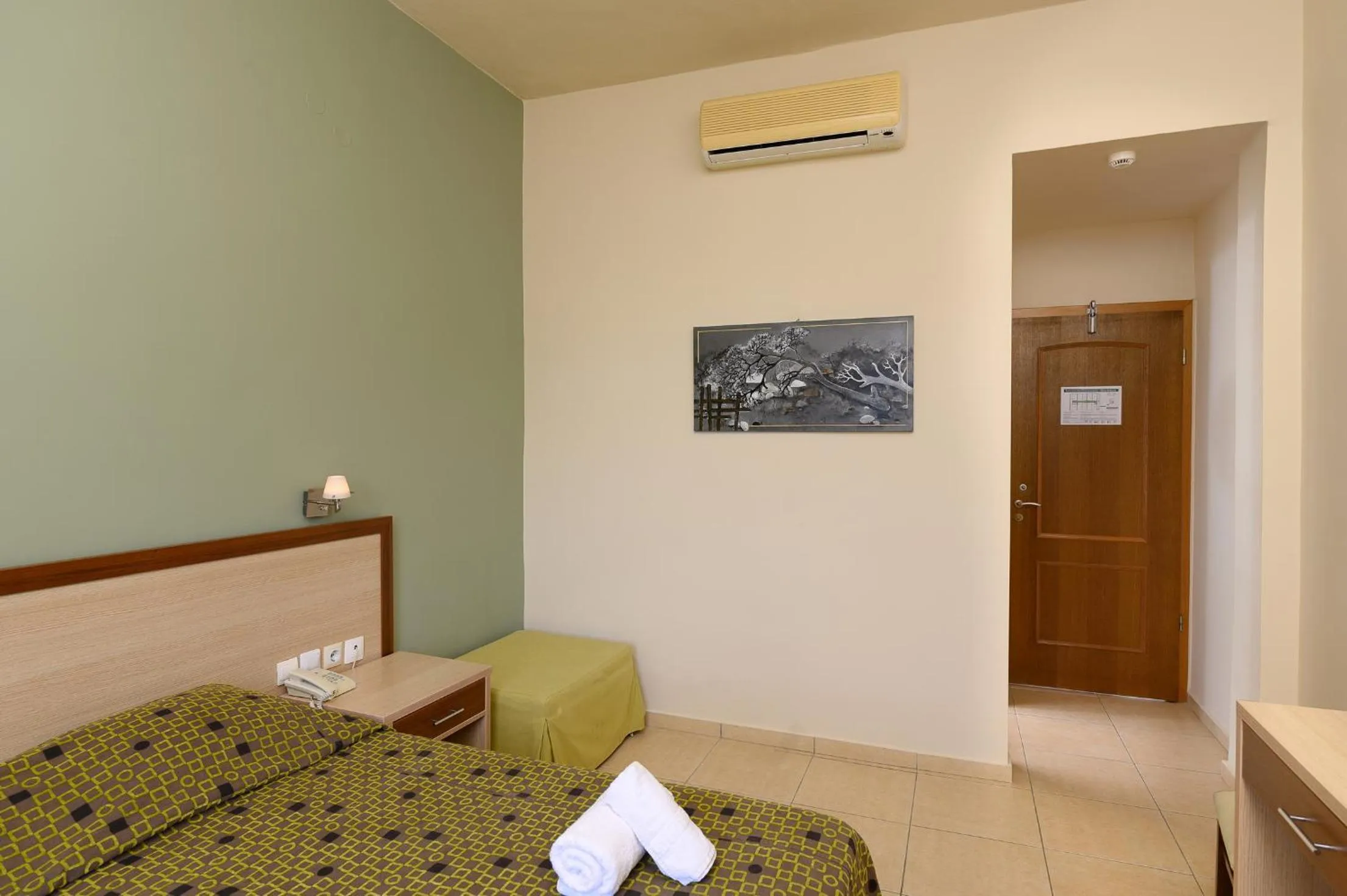 Bed in Alianthos Beach Hotel