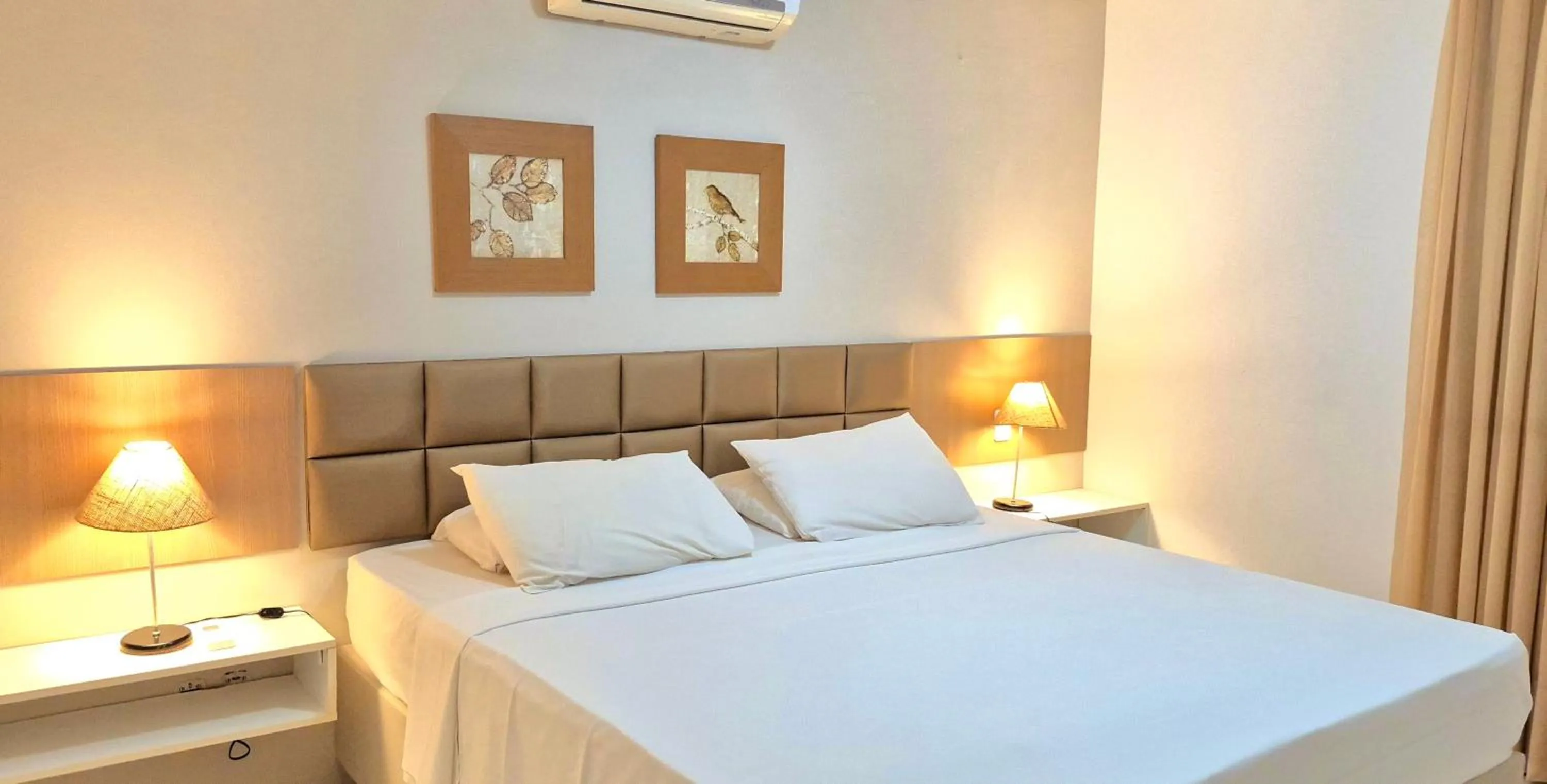 Bed in Atlantic Palace Family inn