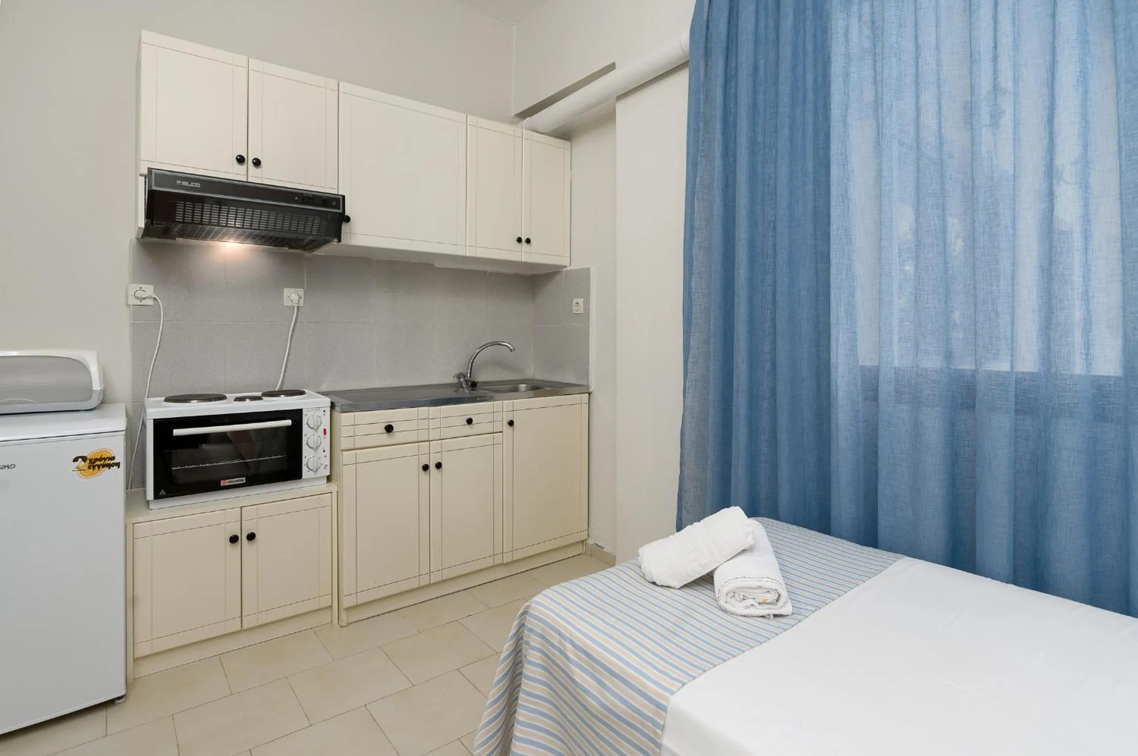 Kitchen or kitchenette, Bed in Anthos Apartments