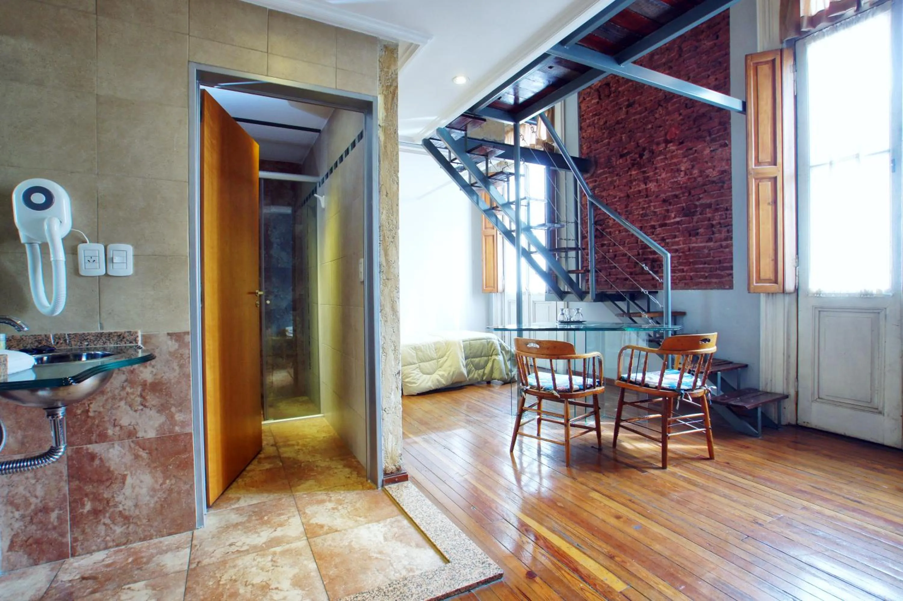 Bedroom in La Fresque Hotel